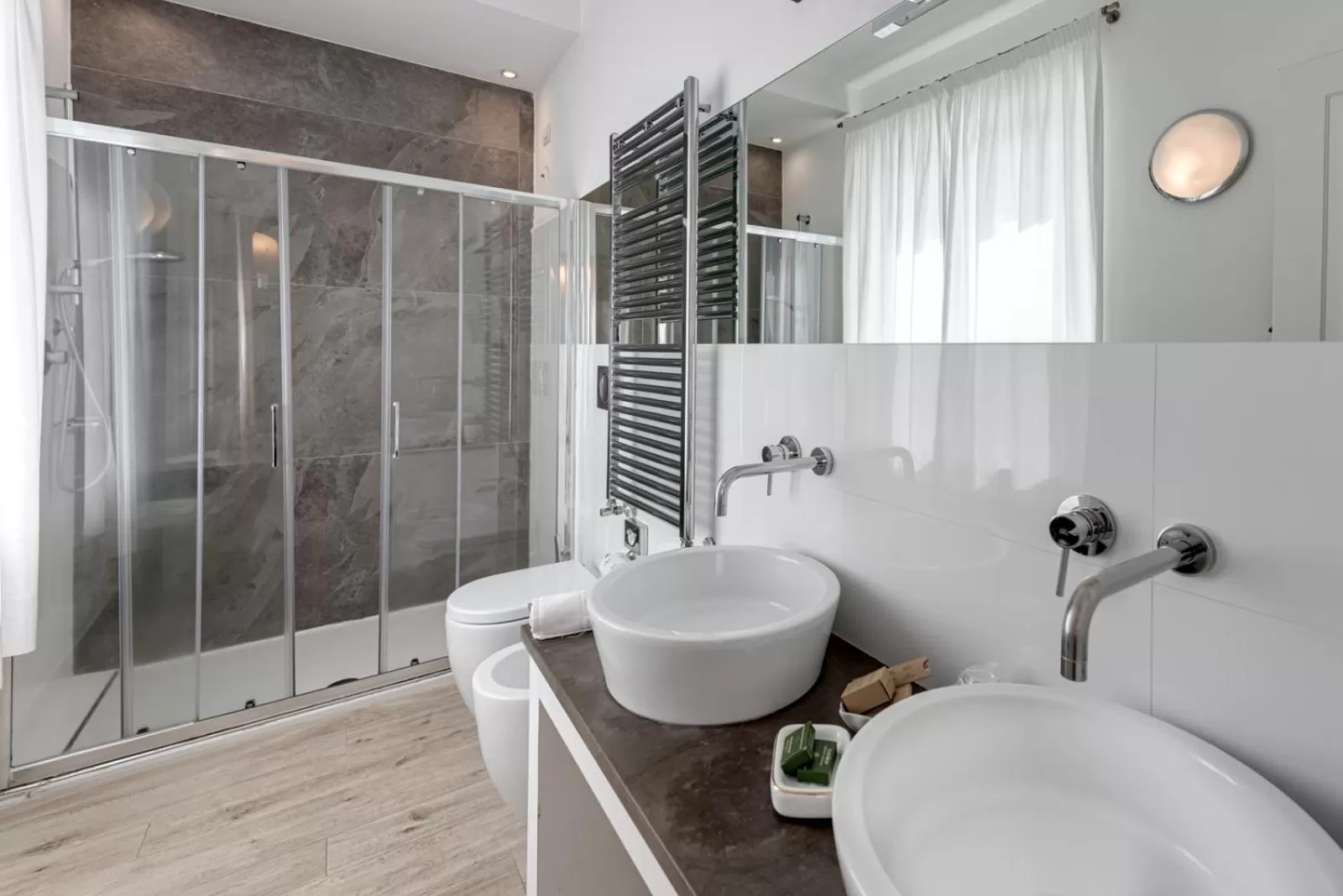 Bathroom in VILLA LIBERTY Boutique Hotel - Borgo Capitano Collection