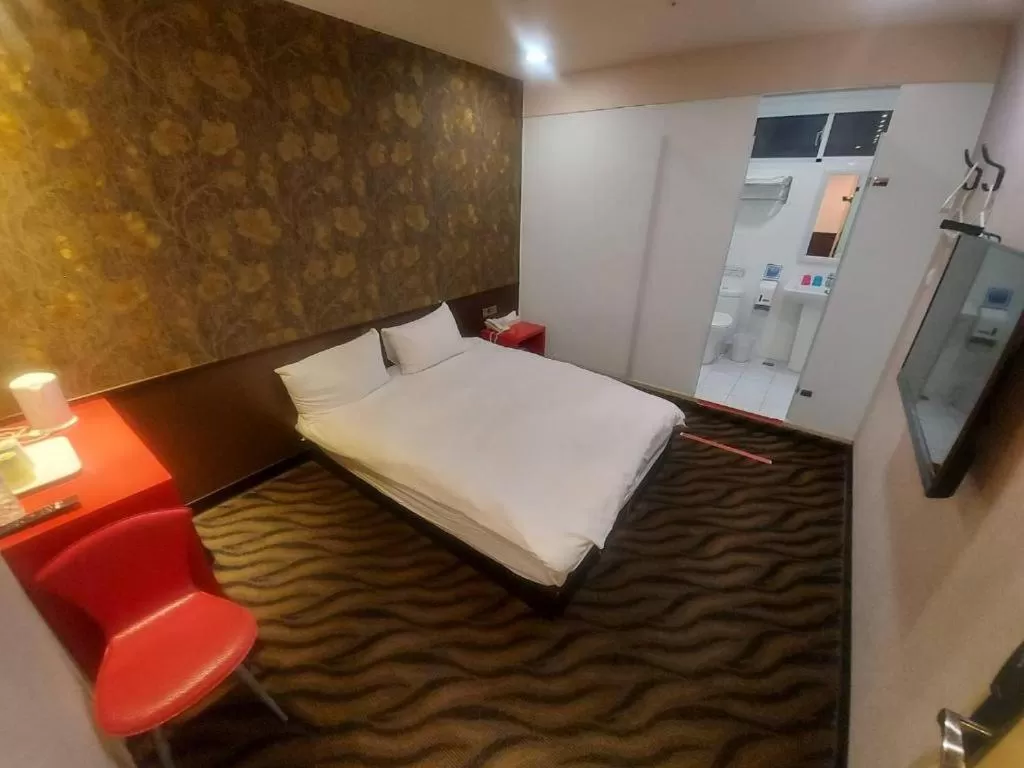 Bed in Funny Ximen Hotel