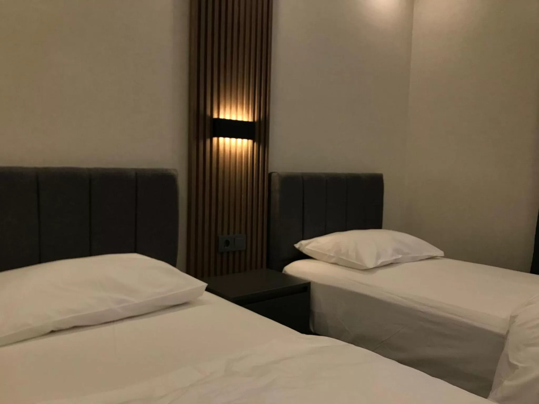 Bed in Yılmaz Suit Apartments