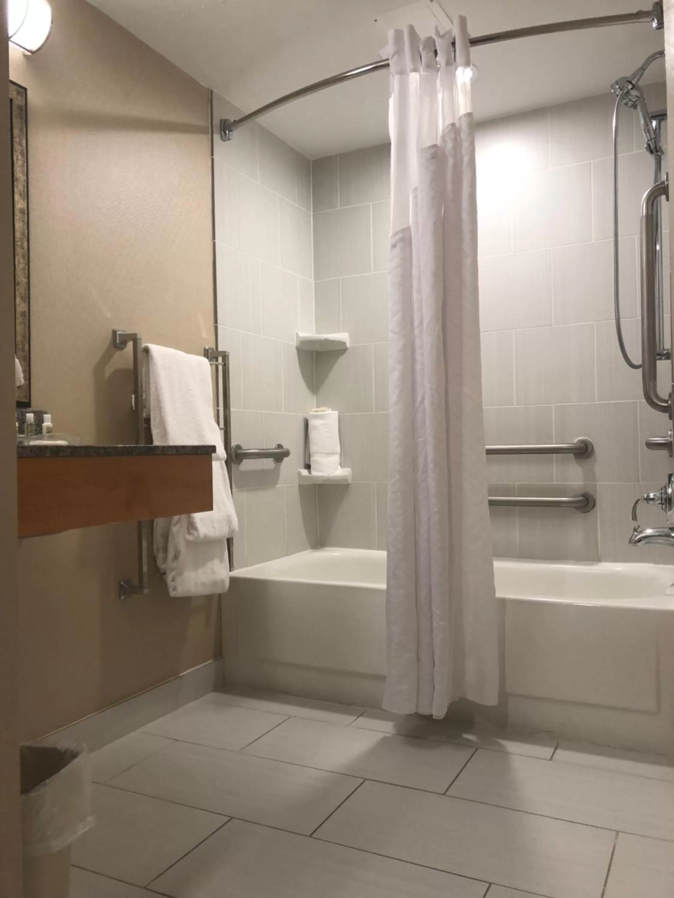 Shower in Holiday Inn Raleigh Downtown by IHG