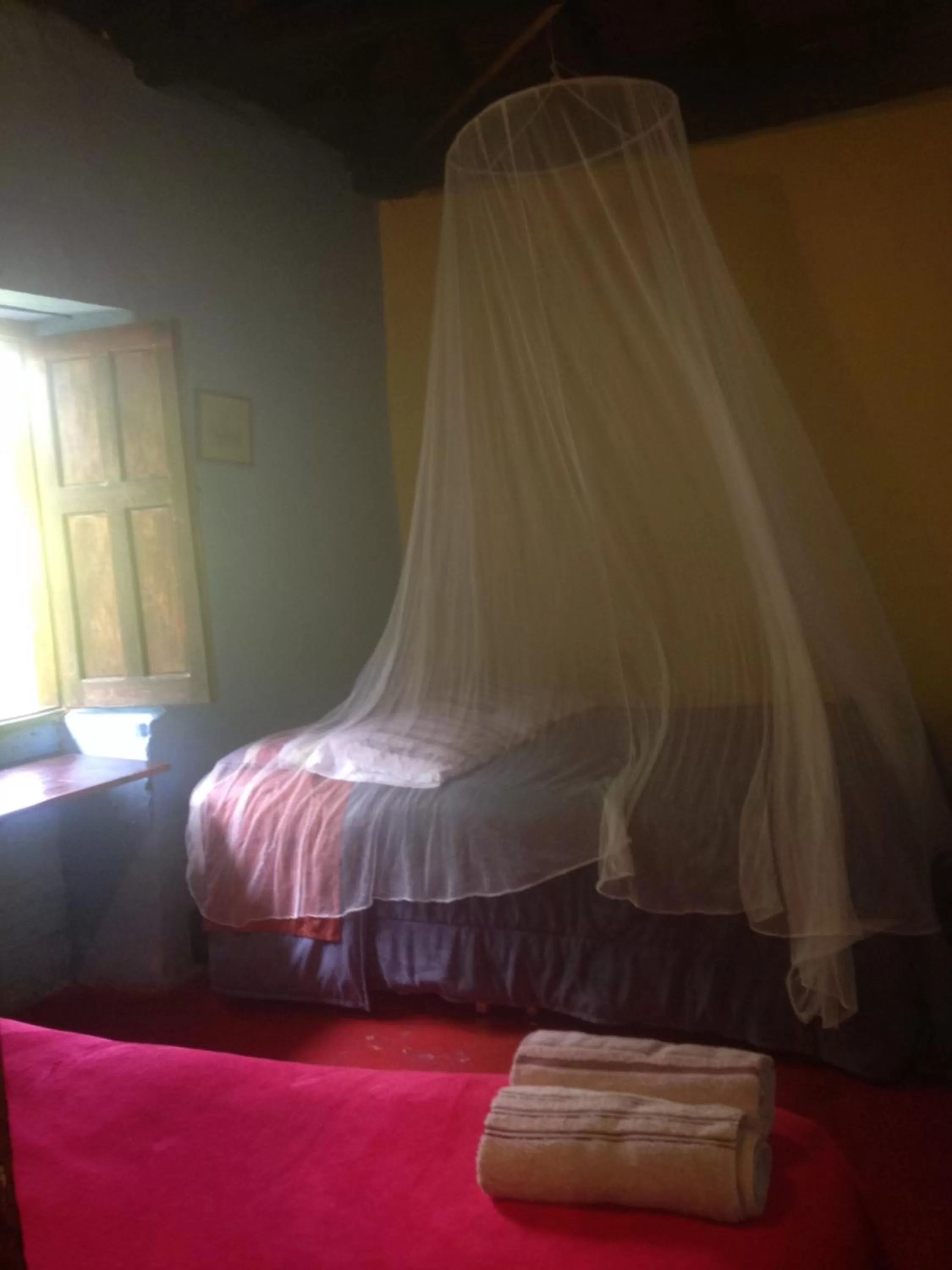 Bedroom, Bed in Casa finca típica the lake hotel