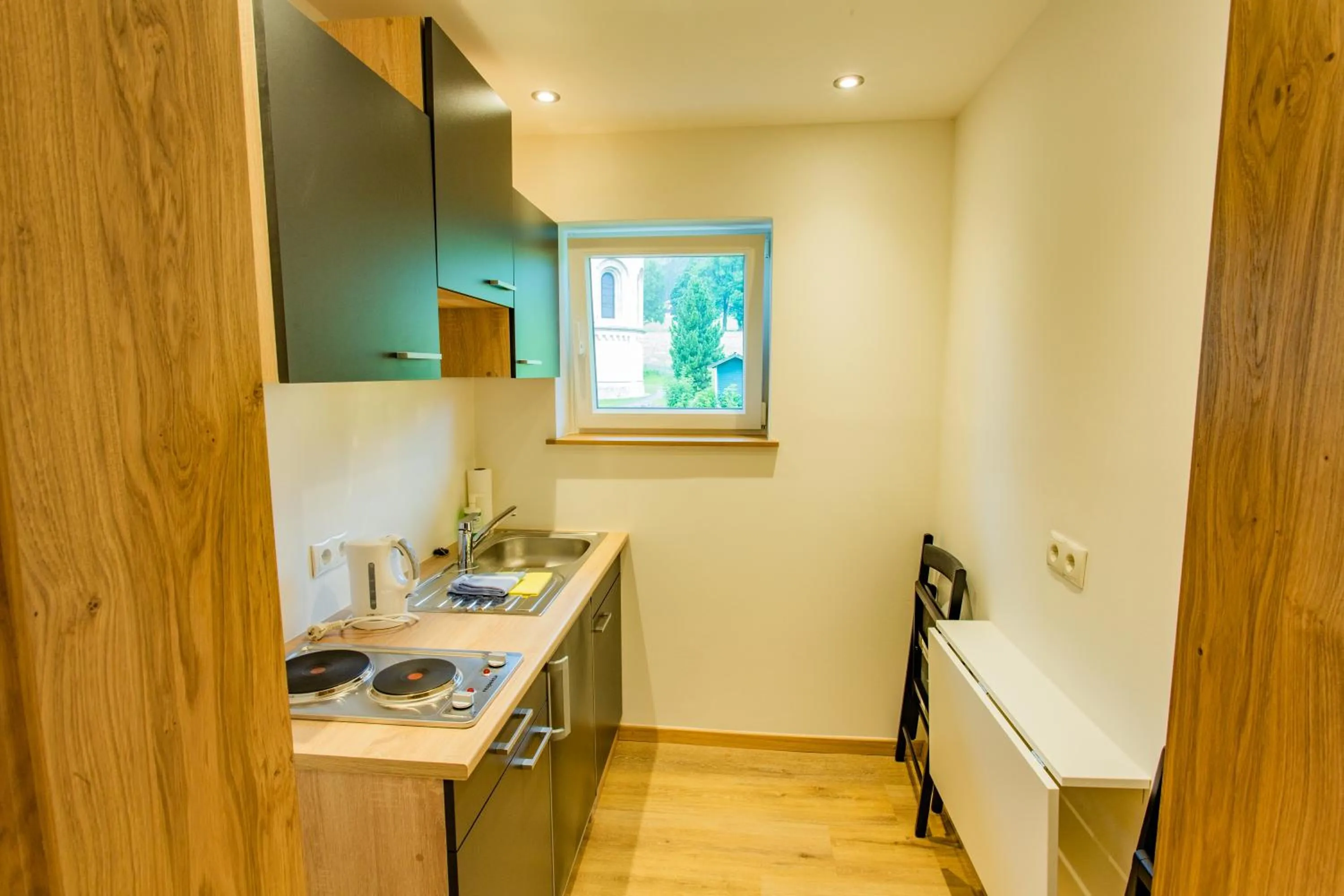 Kitchen or kitchenette in Aktivhotel Pehab - Dachstein Rooftop-Spa