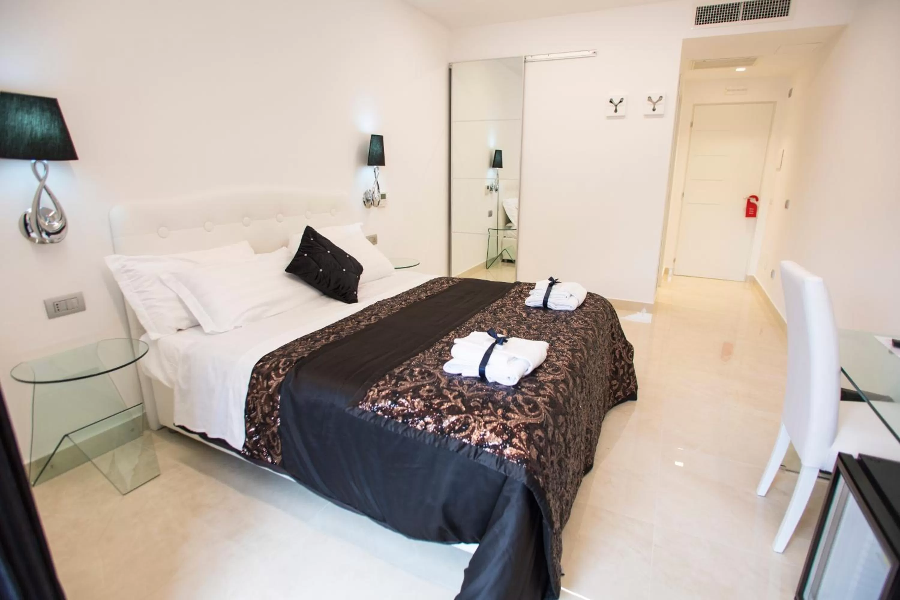 Bed in San Pietro Grand Suite