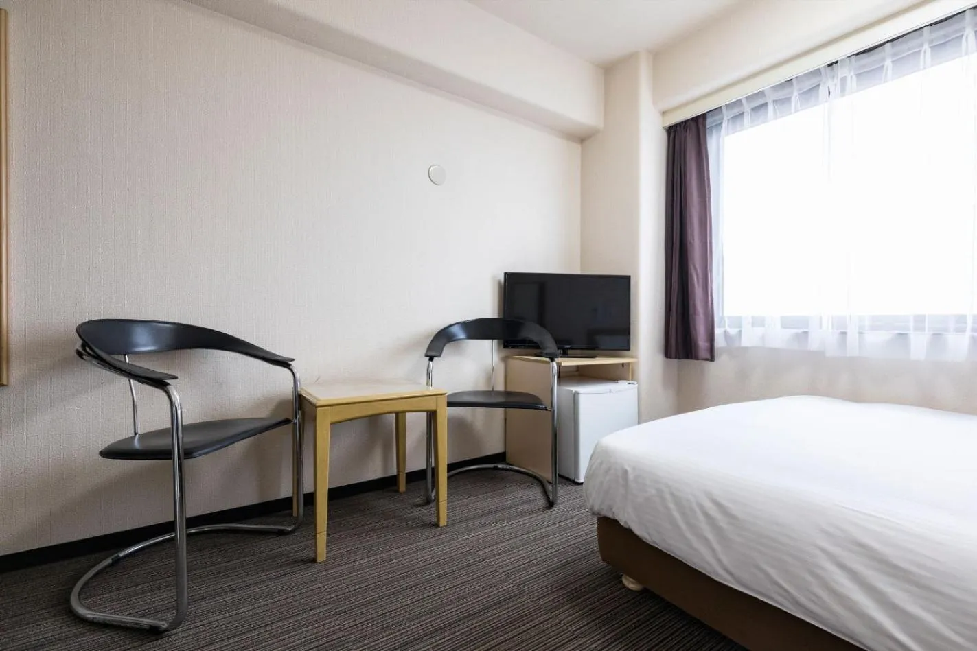 Photo of the whole room, Bed in KOKO STAY Kumamoto Yatsushiro - formerly Hotel Wing International Kumamoto Yatsushiro