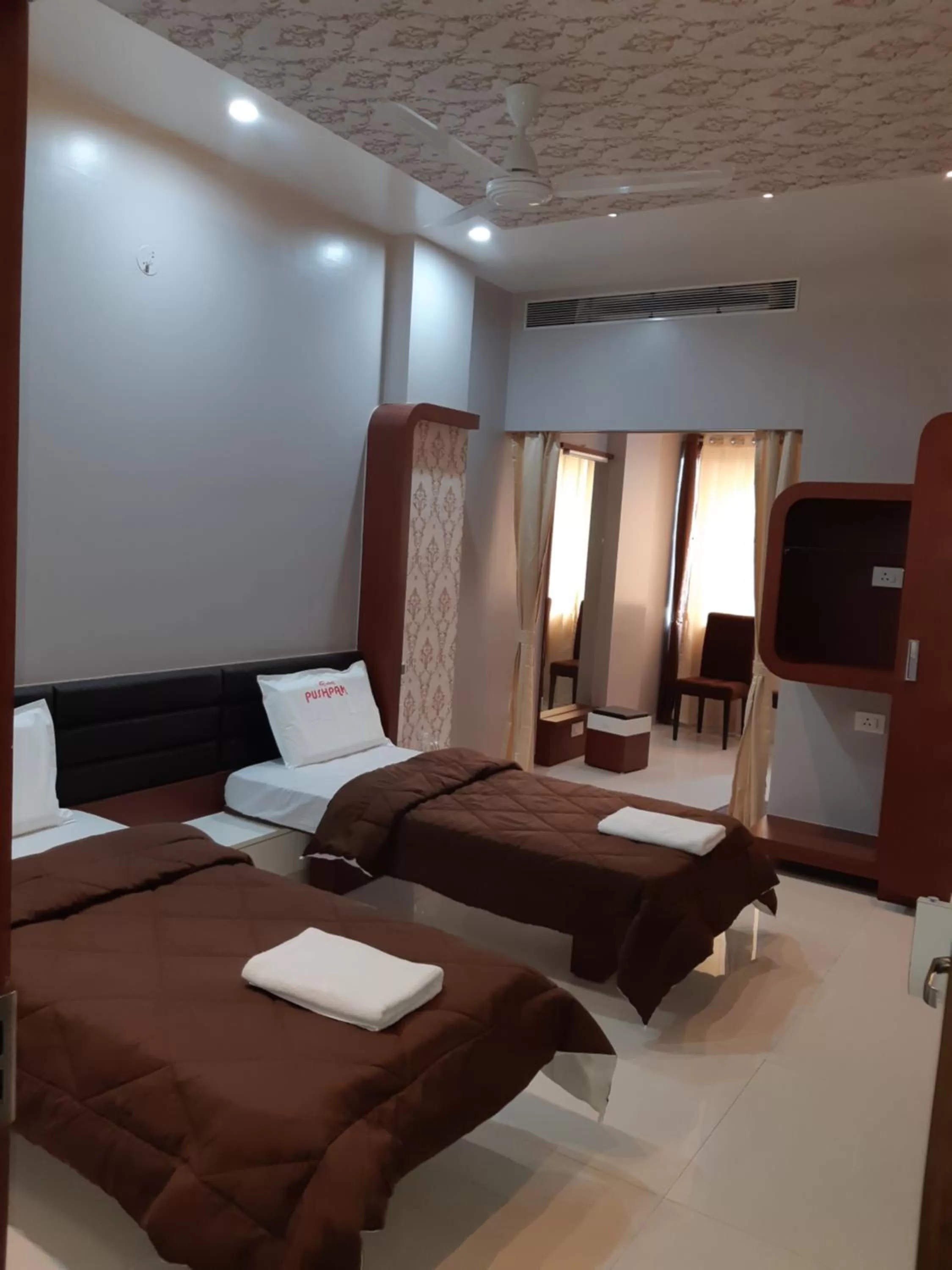 Photo of the whole room, Bed in Hotel Pushpak