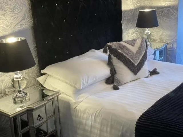 Bed in The Lilly Restaurant With Rooms