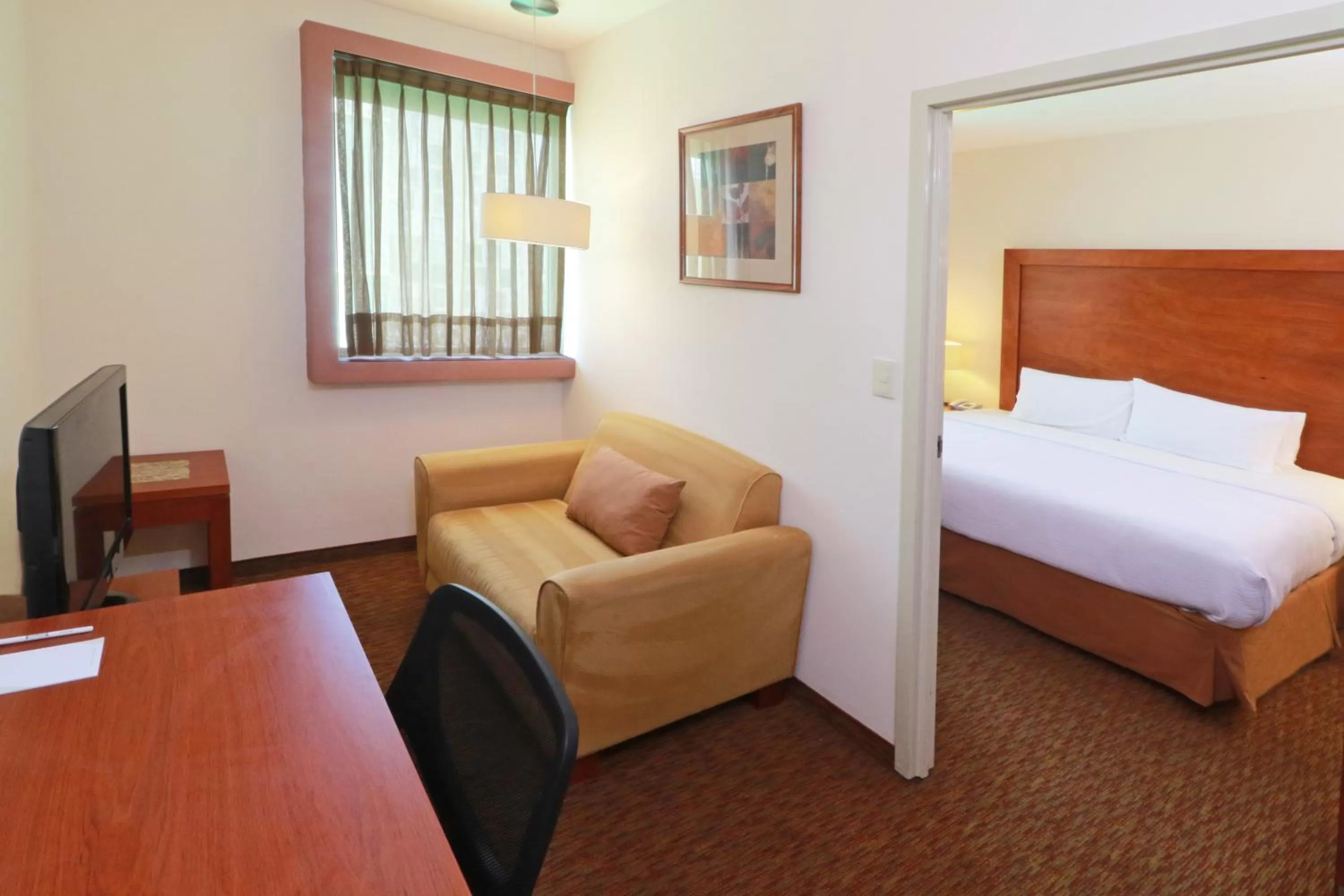 Photo of the whole room, Bed in Staybridge Suites Queretaro by IHG