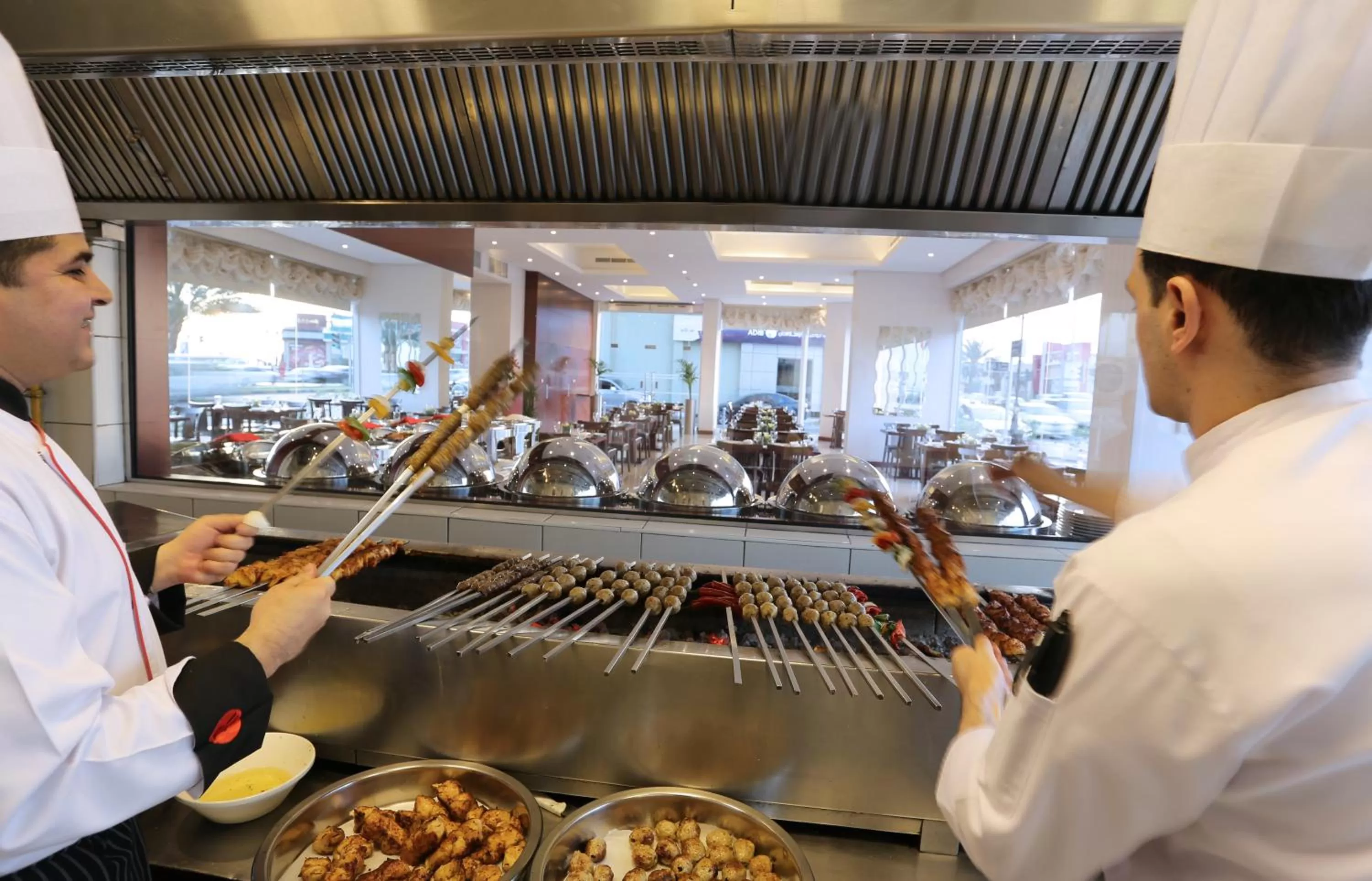 Communal kitchen in Ramada by Wyndham Beach Hotel Ajman