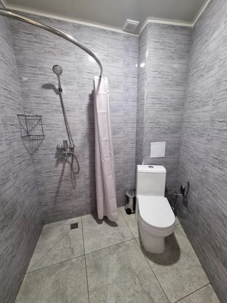 Toilet, Bathroom in REVEL HOTEL