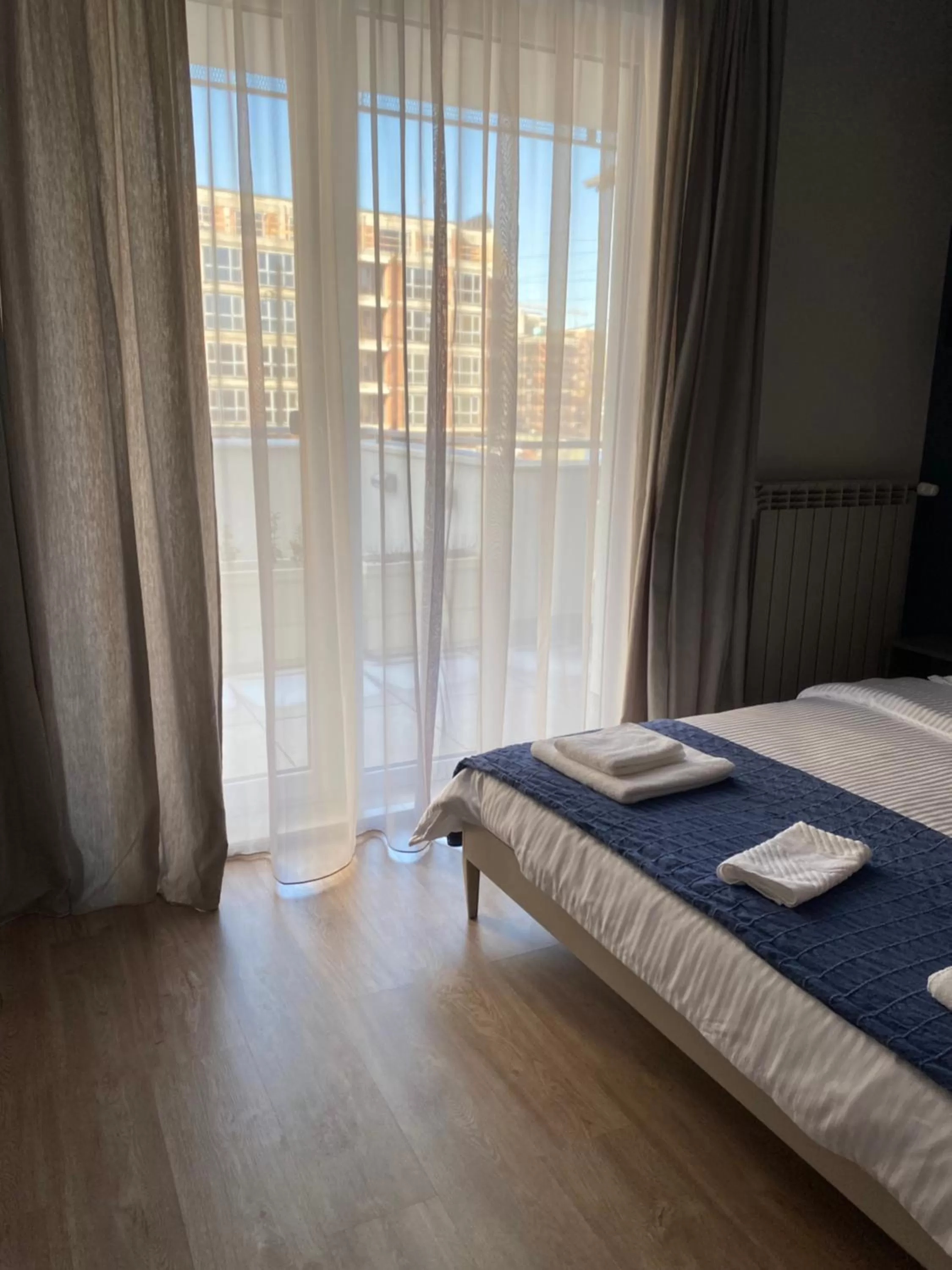 Bed in 7th Sense boutique apartments