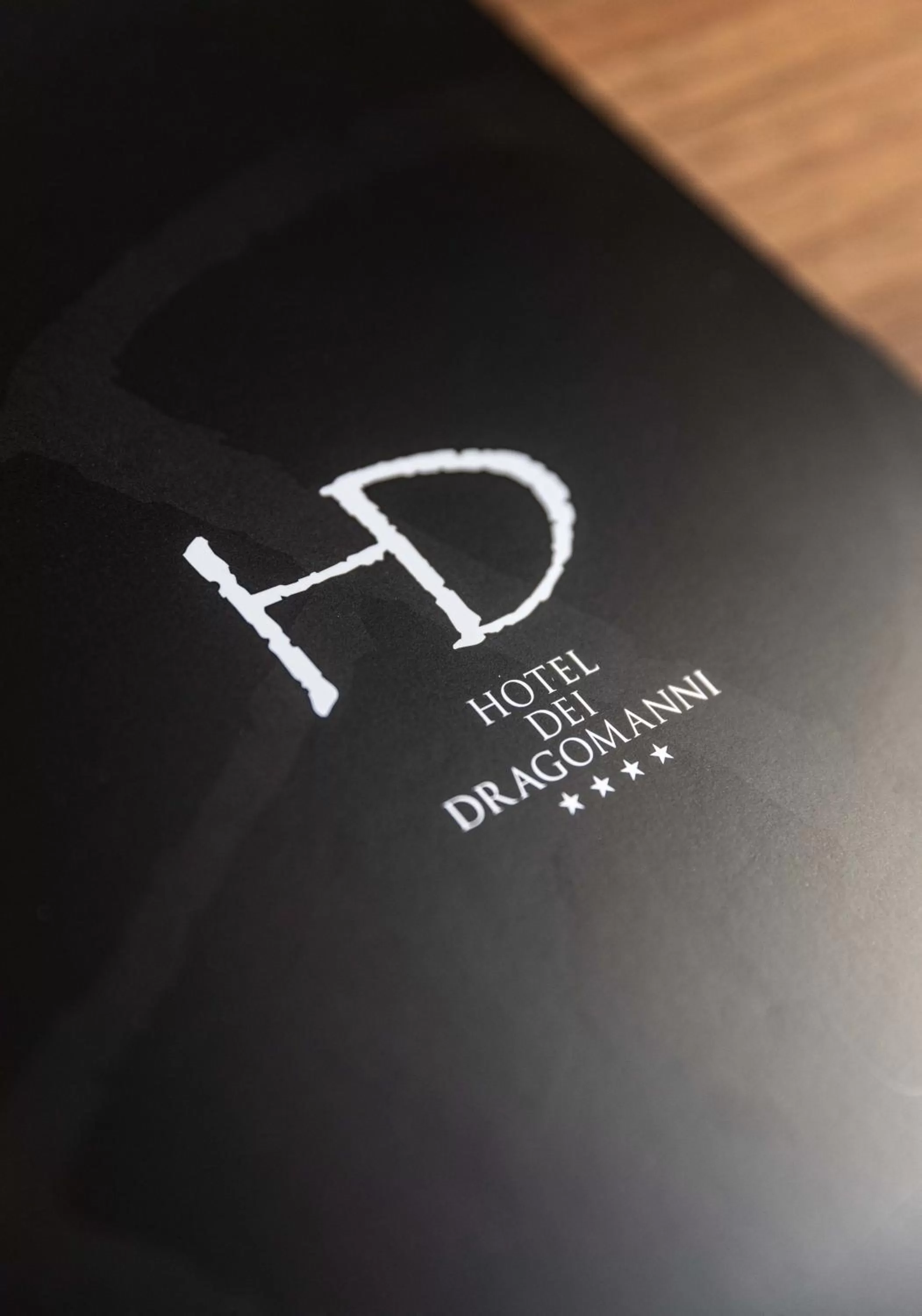 Property logo or sign in Hotel Dei Dragomanni