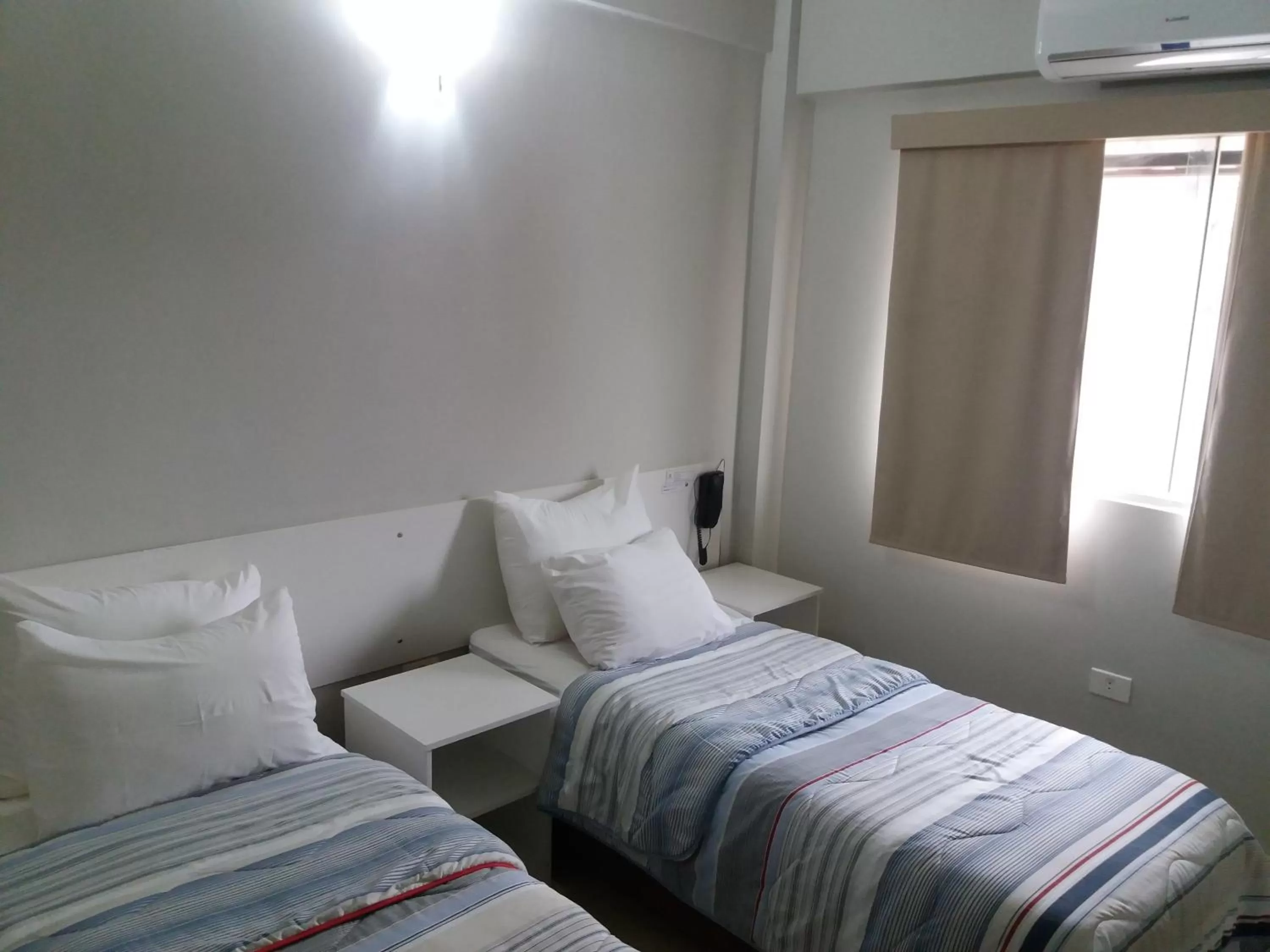 Bed in Madame Lynch Hotel Boutique