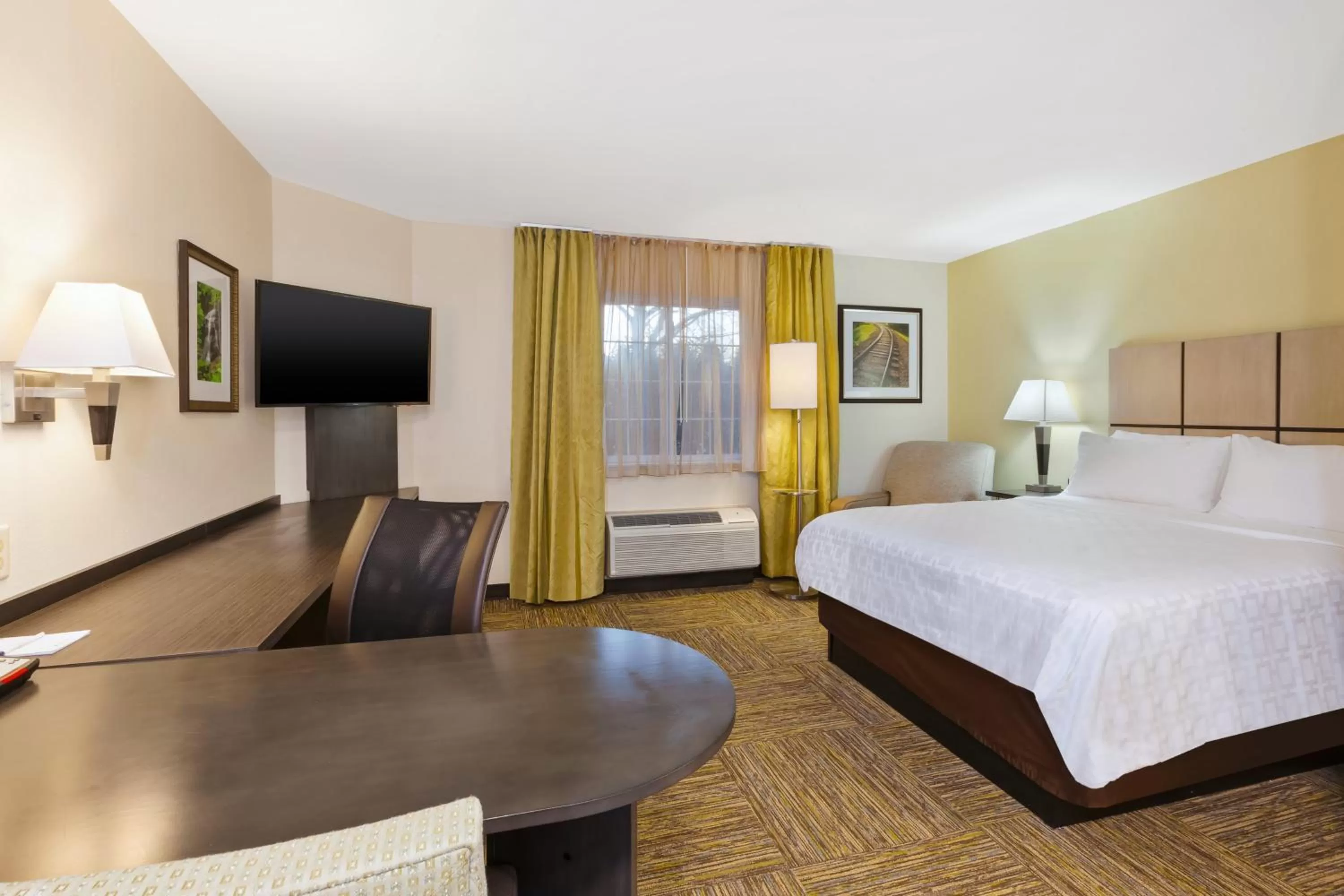 Photo of the whole room, Bed in Candlewood Suites Huntersville-Lake Norman Area by IHG
