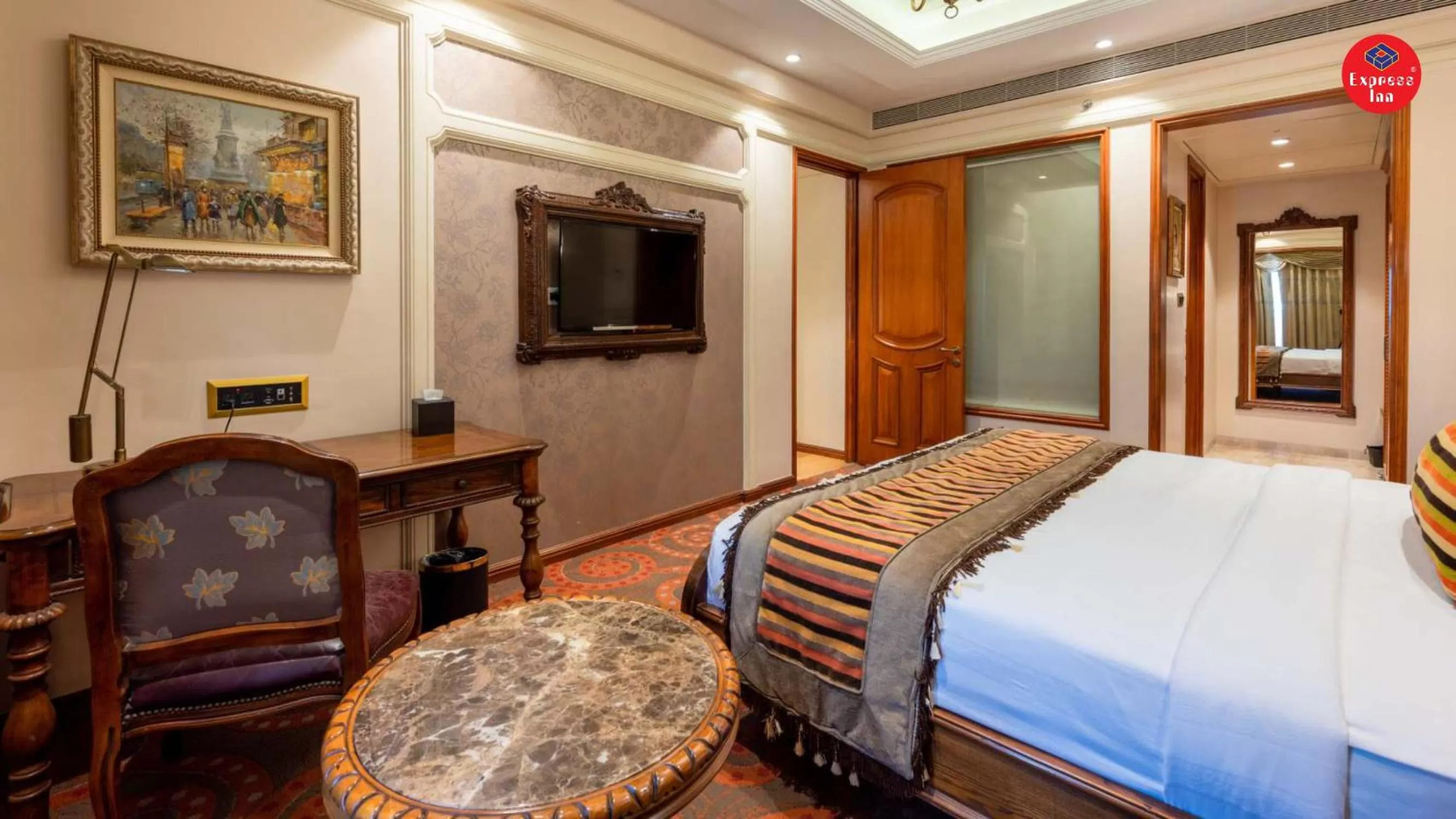 Bed in Express Inn The Business Luxury Hotel