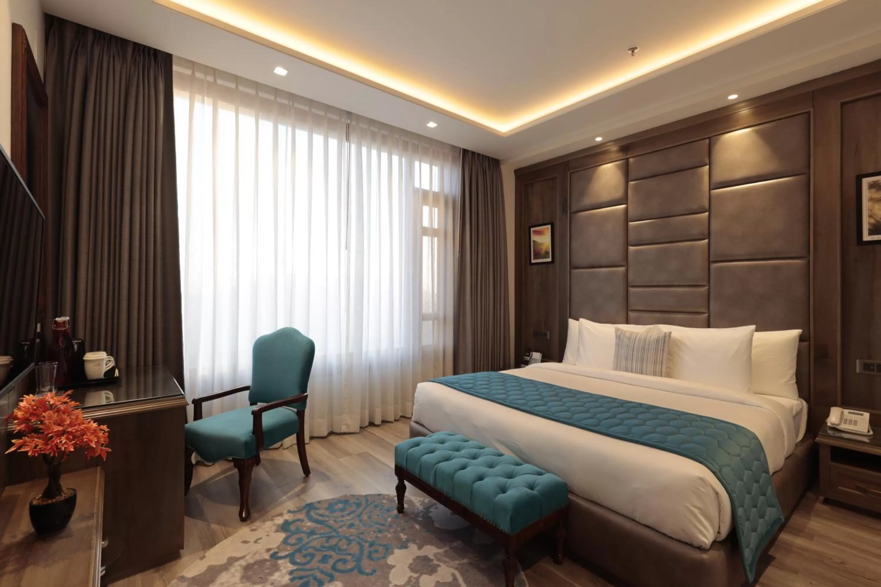 Photo of the whole room, Bed in WelcomHeritage Elysium Resort & Spa