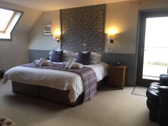 Bed in Standing Stones Hotel