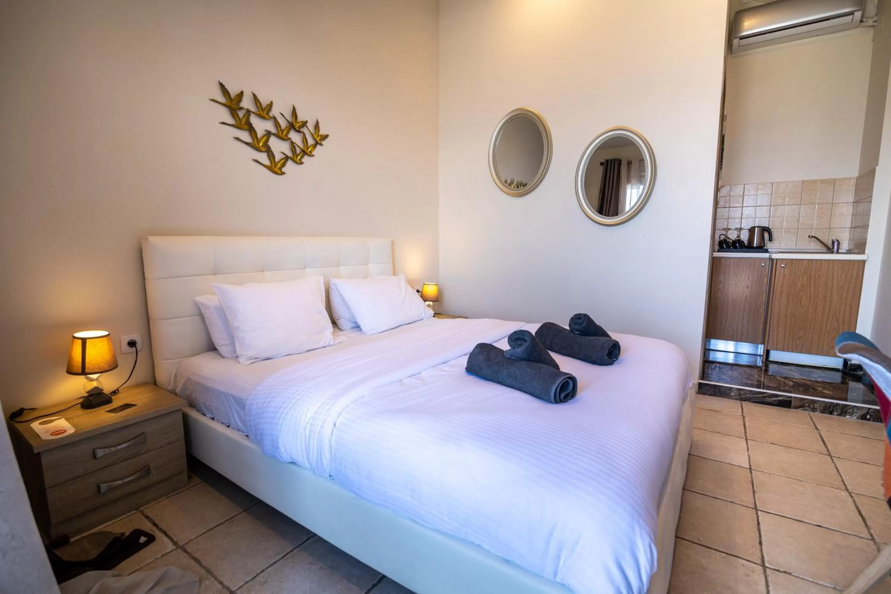 Bed in Votsalakia Hotel & Luxury Apartments