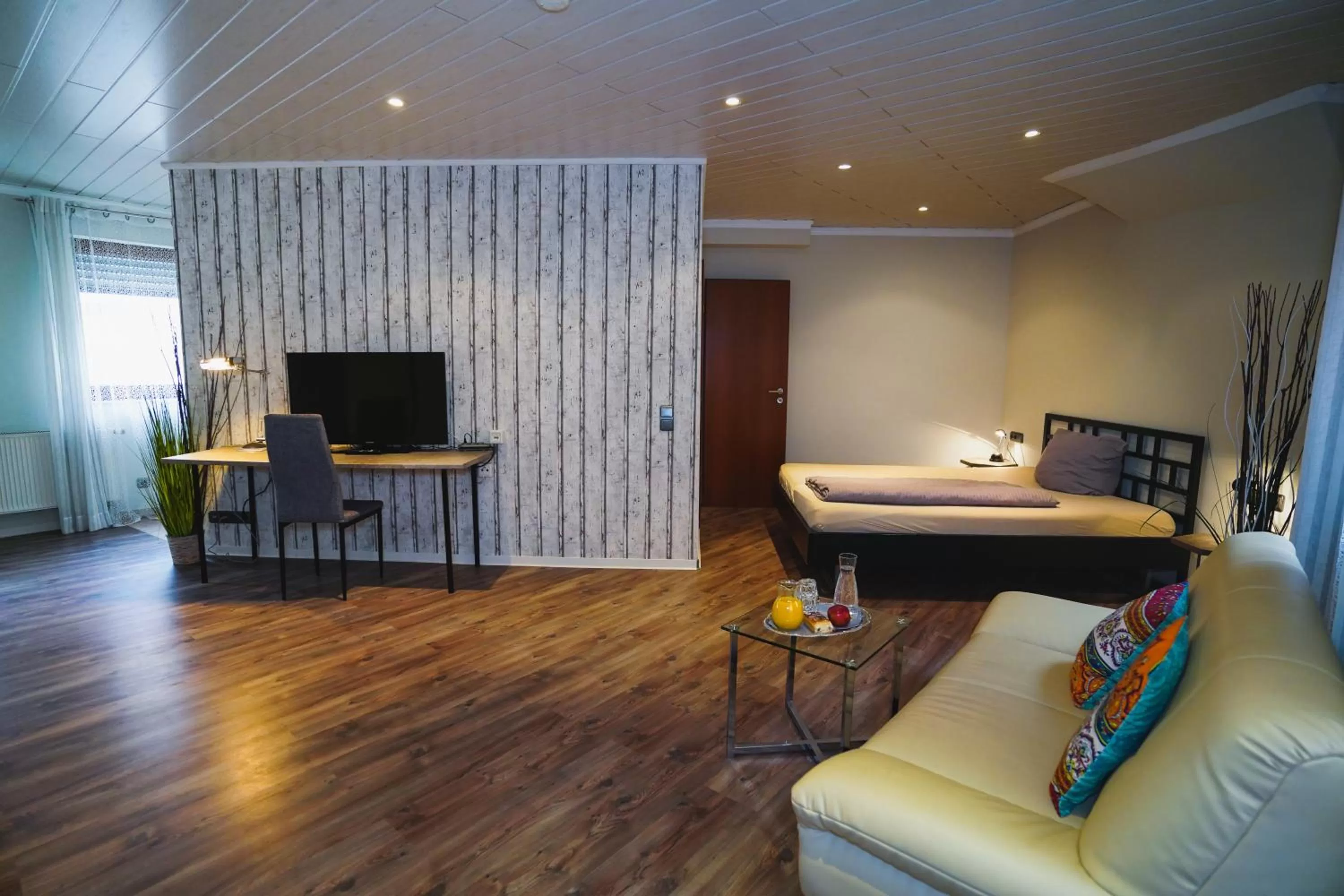 TV/Entertainment Center in Gästehaus Präsenzhof