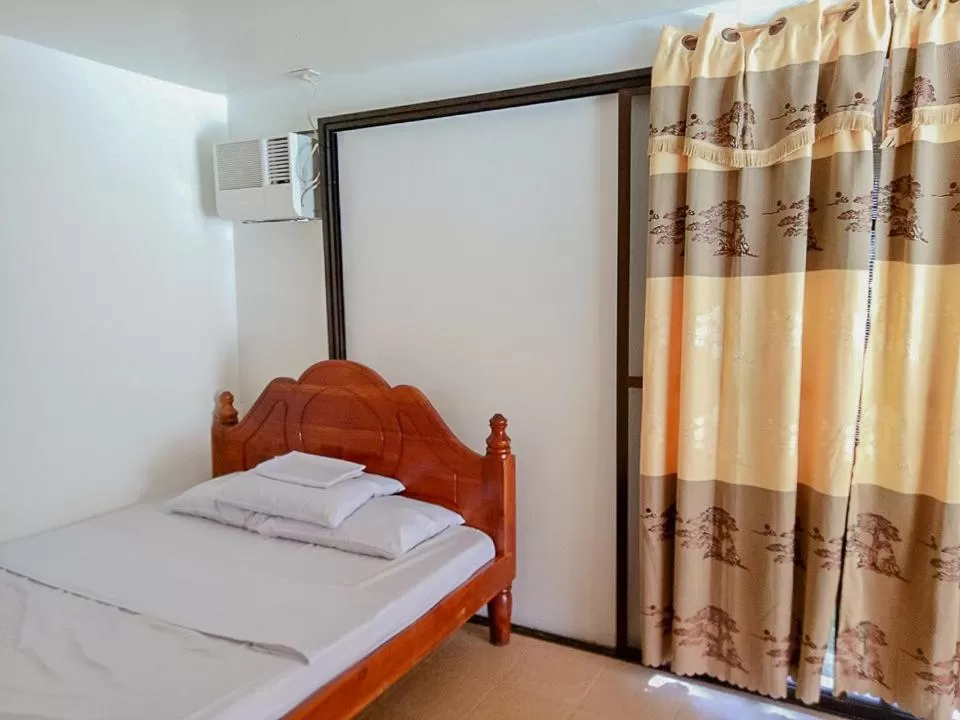 Bed in Camaya-an Paradise Beach Resort