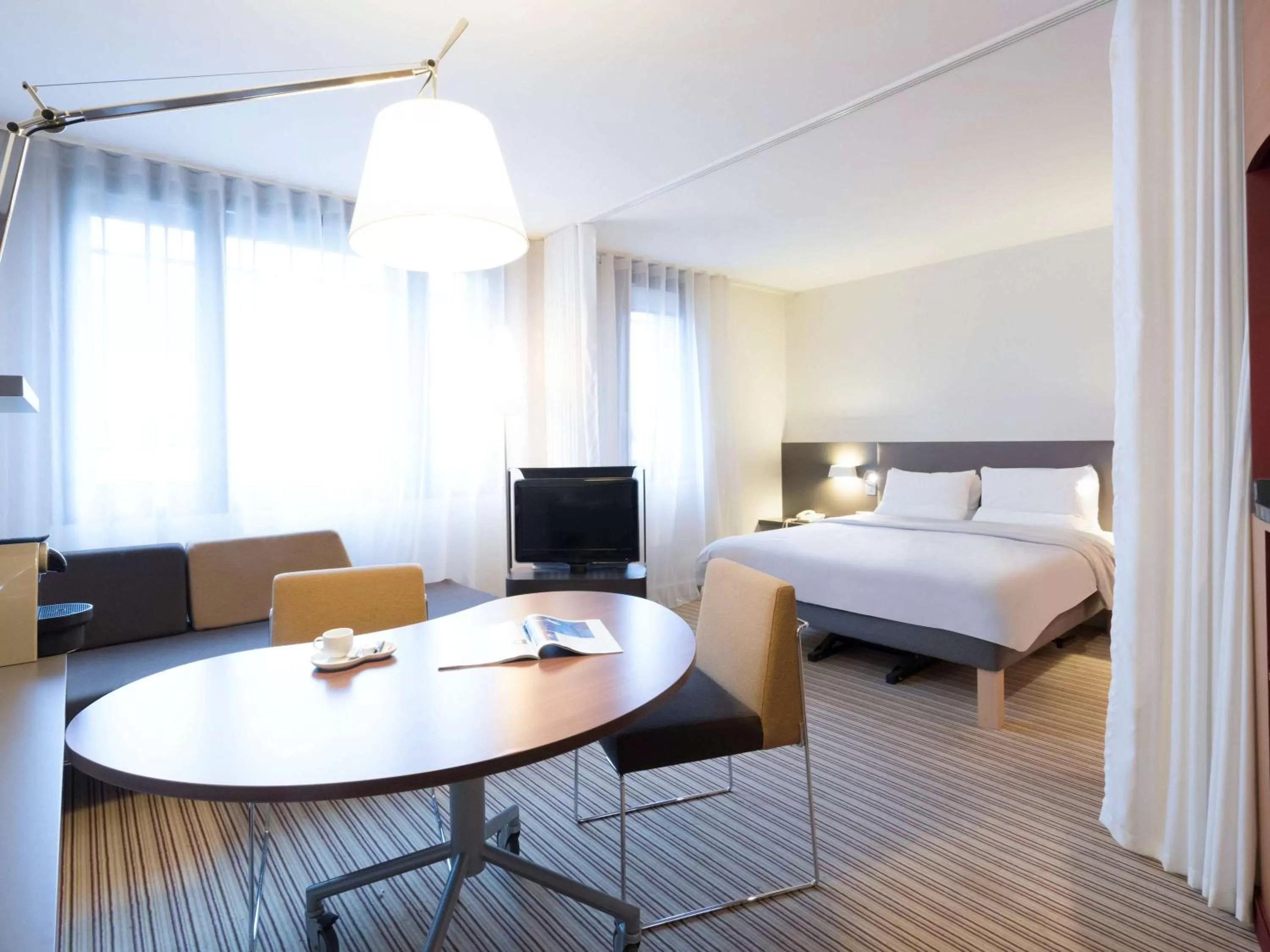 Photo of the whole room, Bed in Novotel Suites Paris Montreuil Vincennes