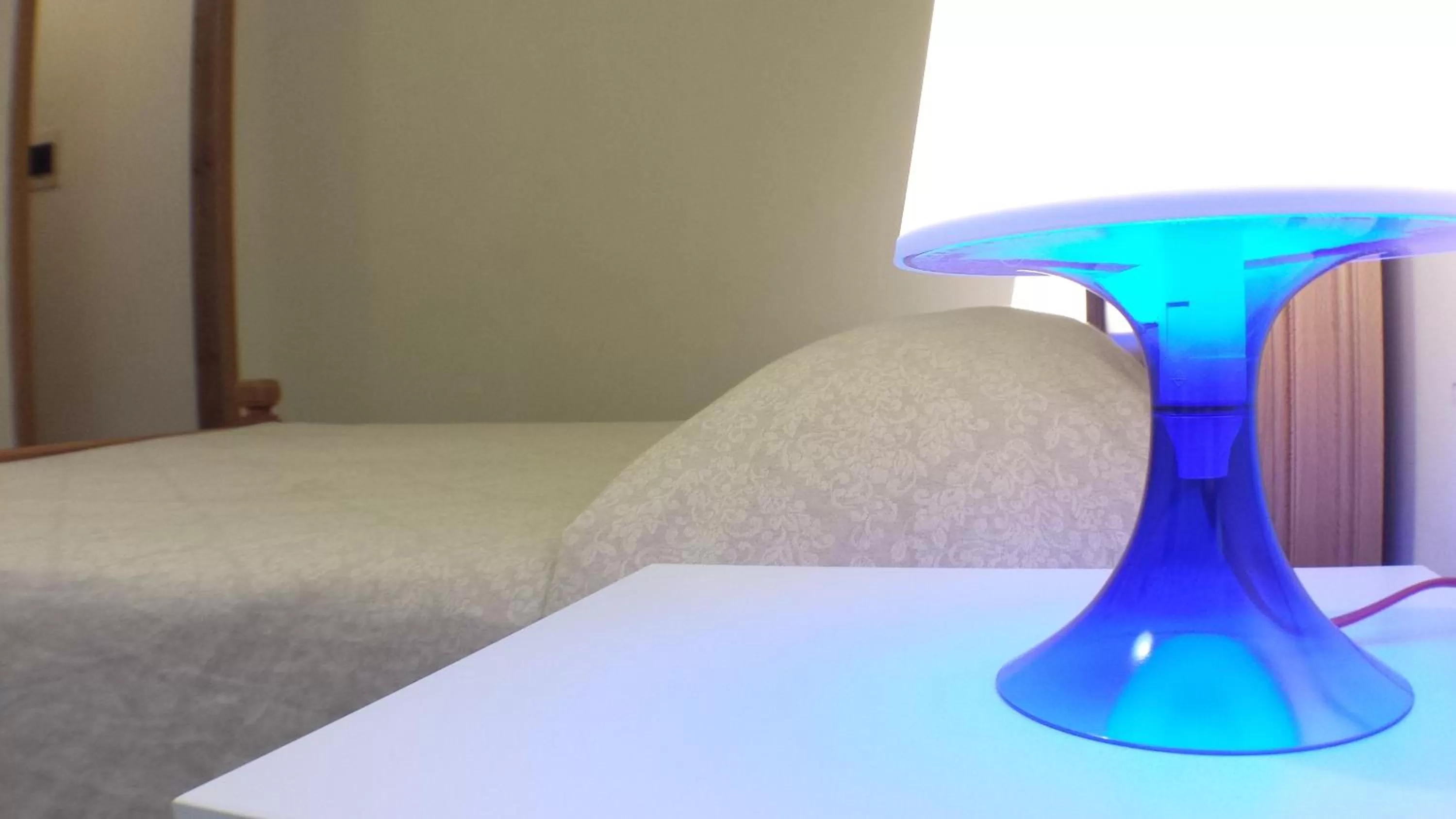 Decorative detail, Bed in Hotel Firenze 2000