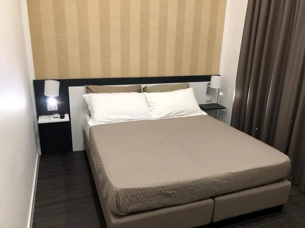 Bed in Hotel Cimarosa