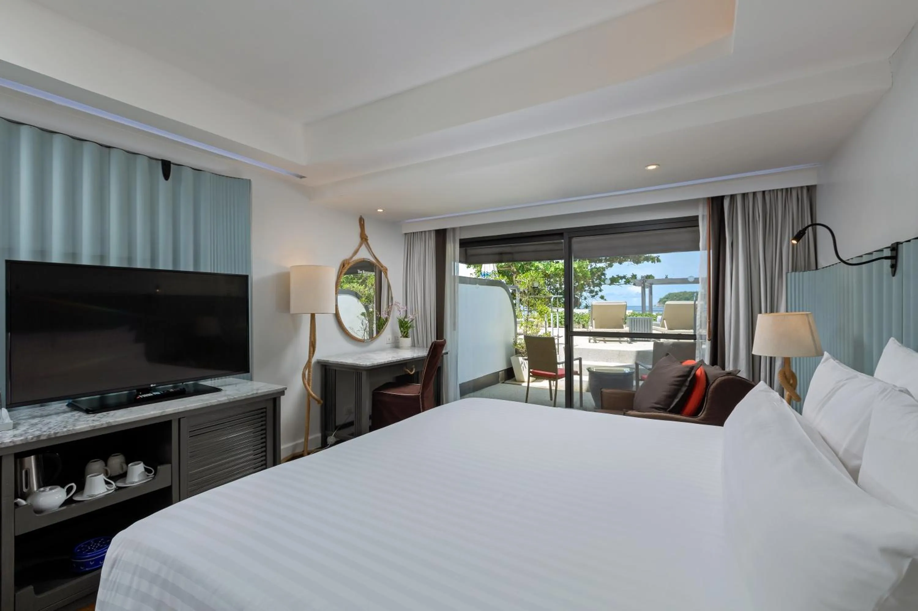 Bed in The Boathouse Phuket-SHA Plus
