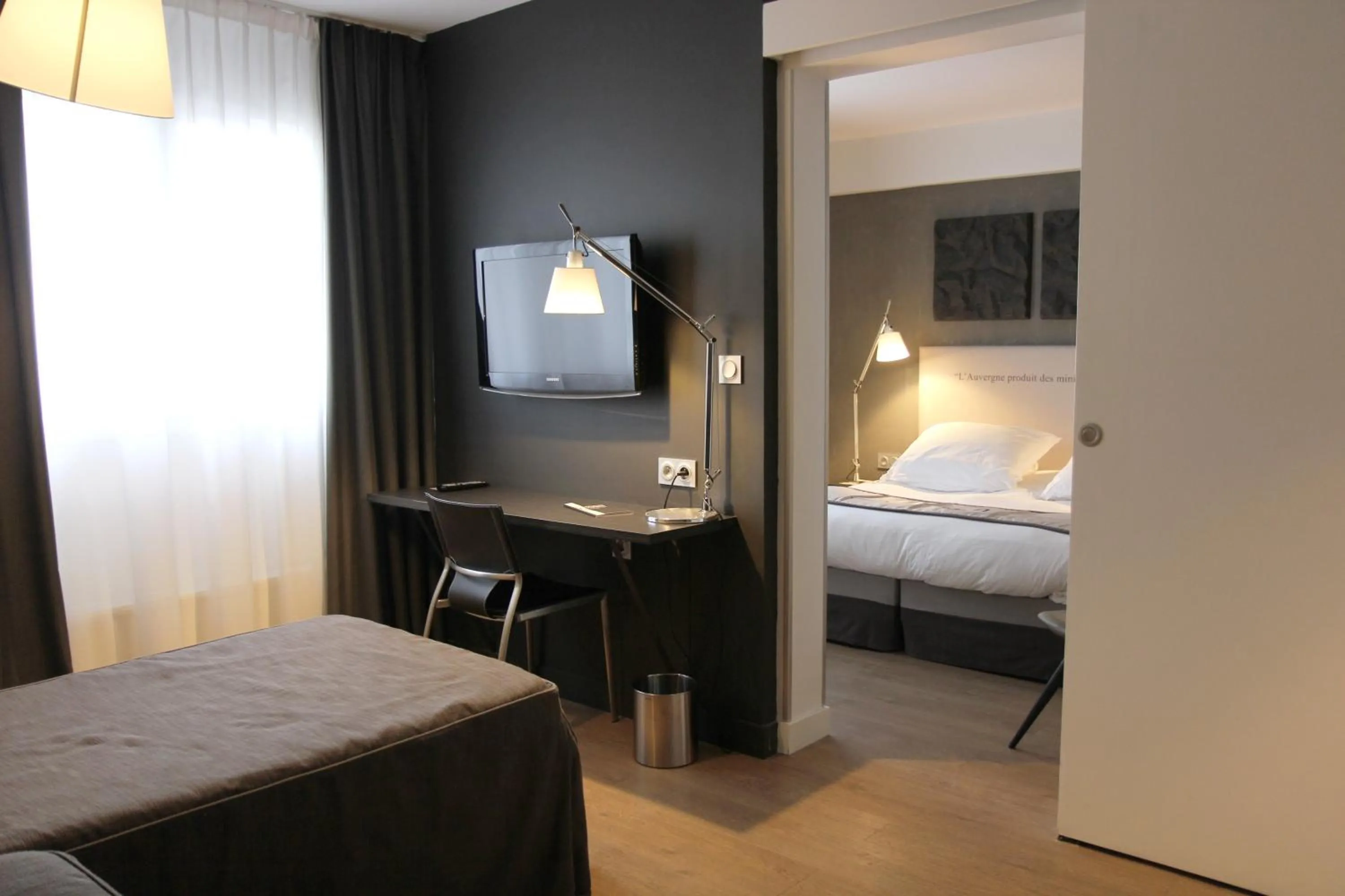 Photo of the whole room, Bed in Hotel Litteraire Alexandre Vialatte, BW Signature Collection