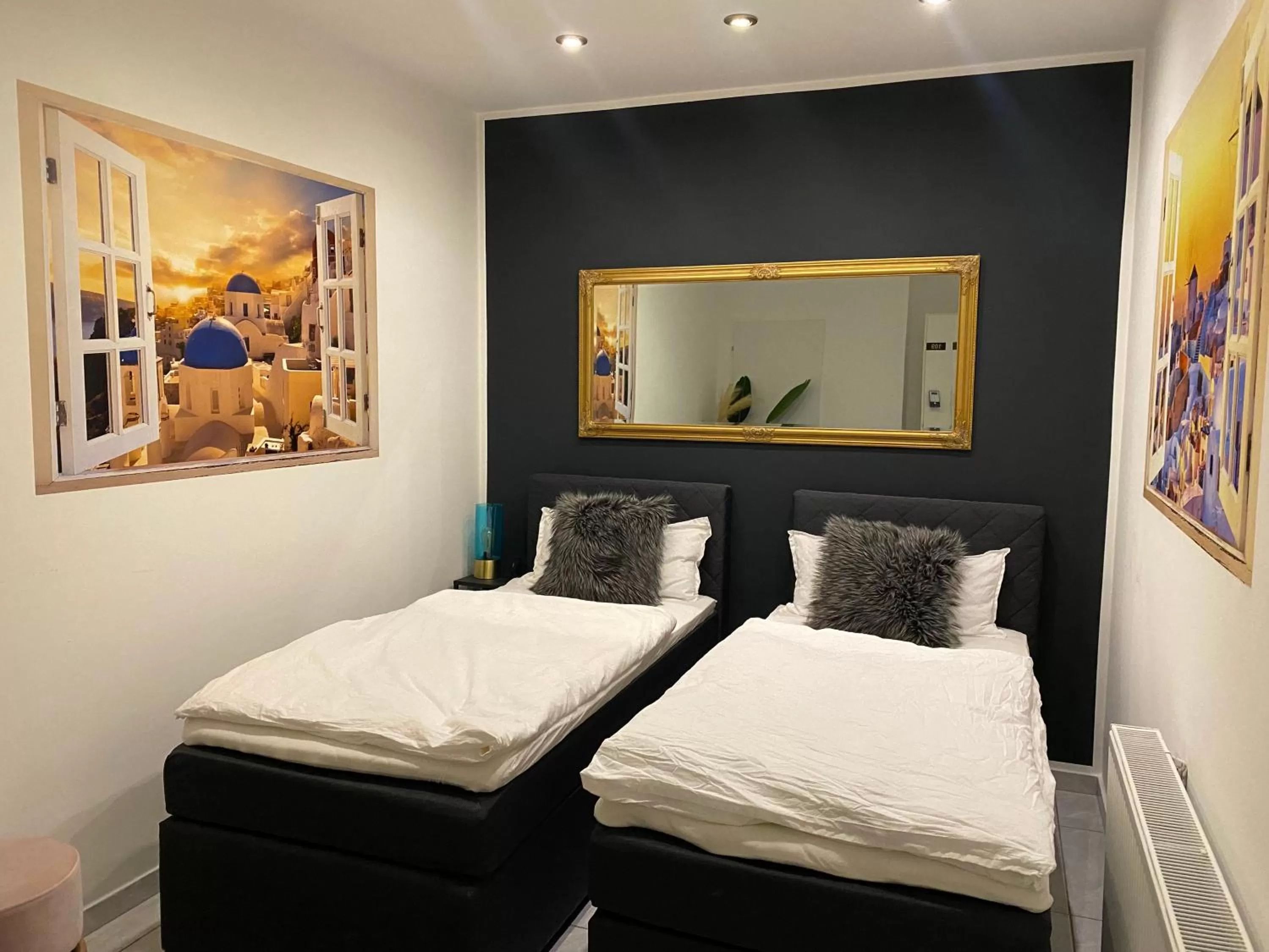 Bed in MARRAM Suitehotel