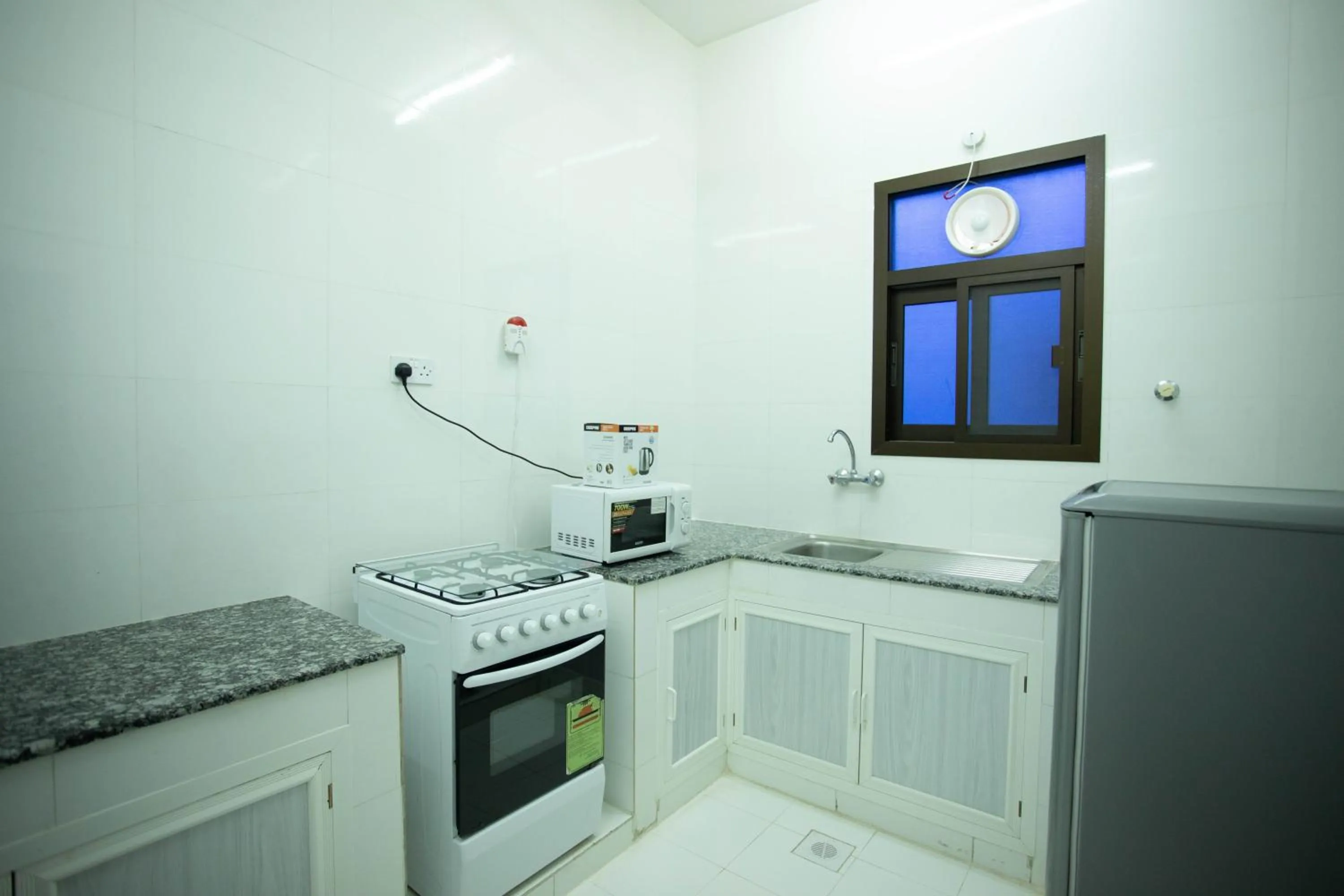 Kitchen/Kitchenette in Star Emirates Furnished Apartment