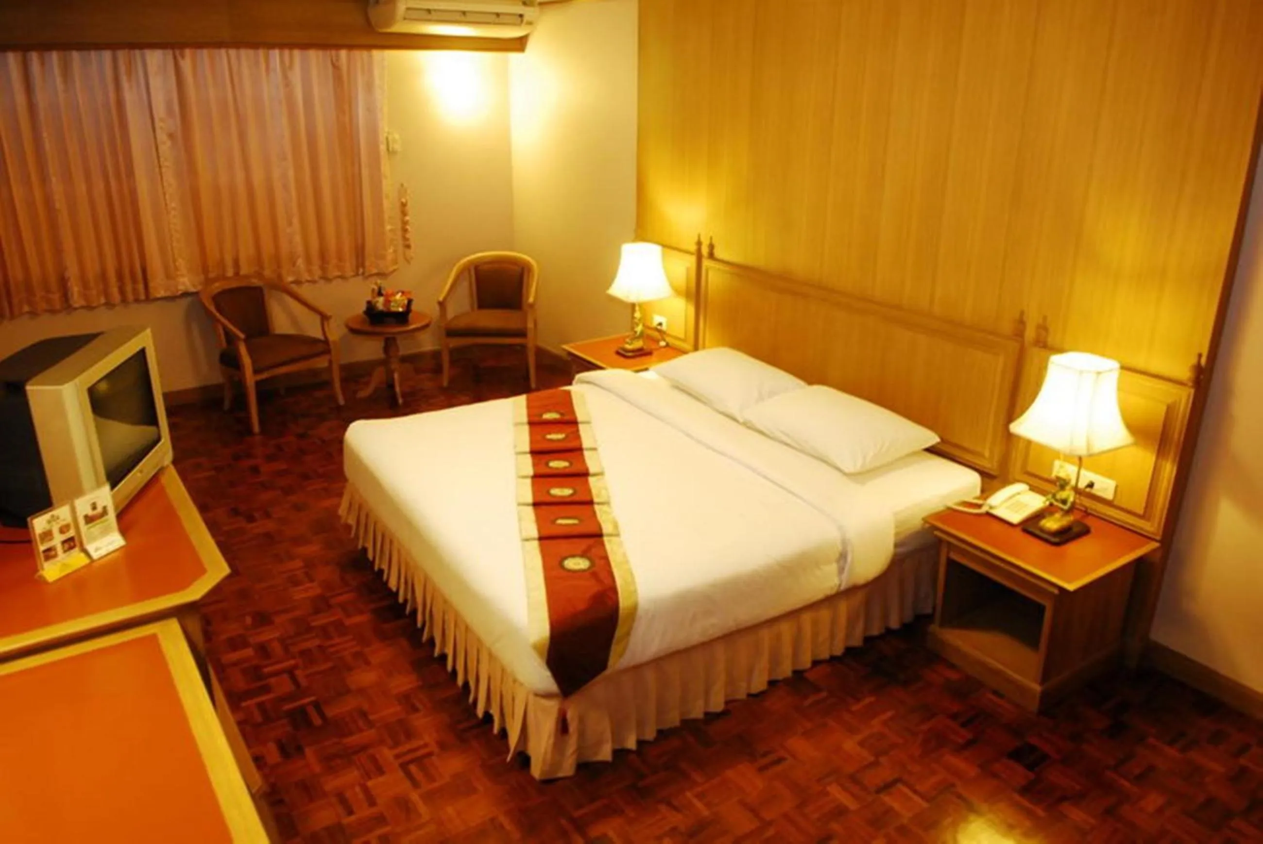 Bed in Silom Village Inn