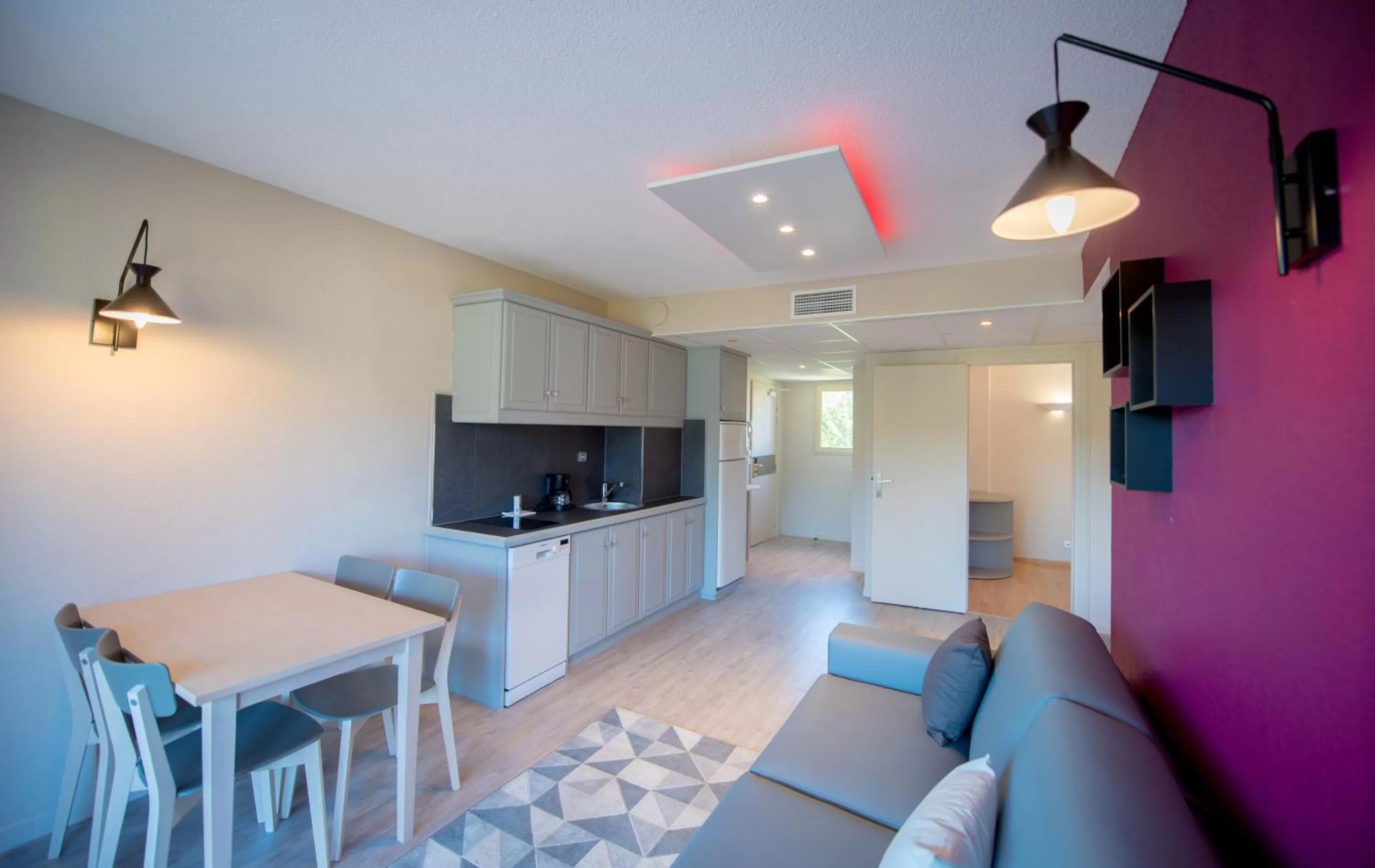 Kitchen or kitchenette in Appart Hotel Lou Castelet