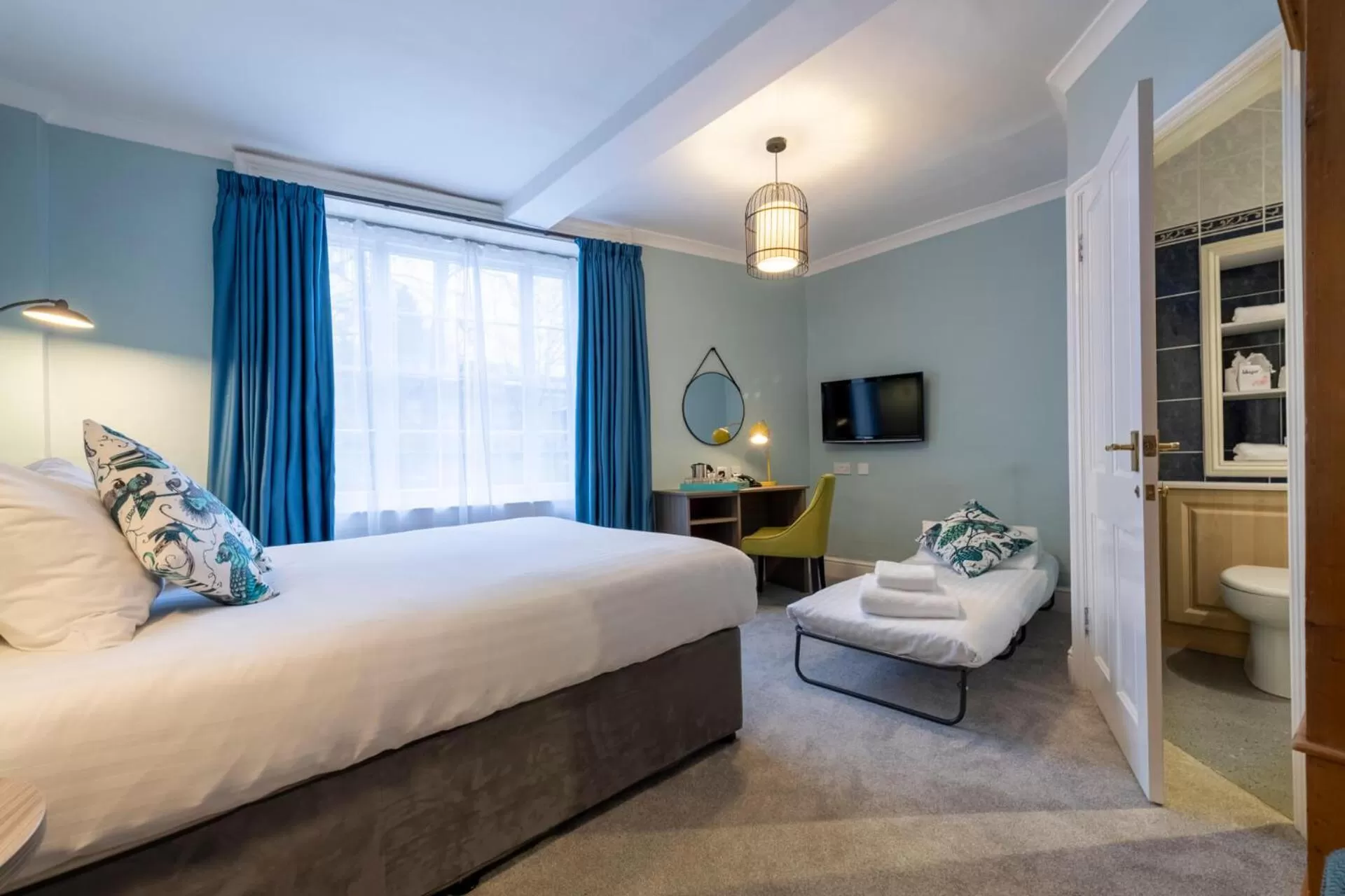 Photo of the whole room, Bed in Wisteria Hotel