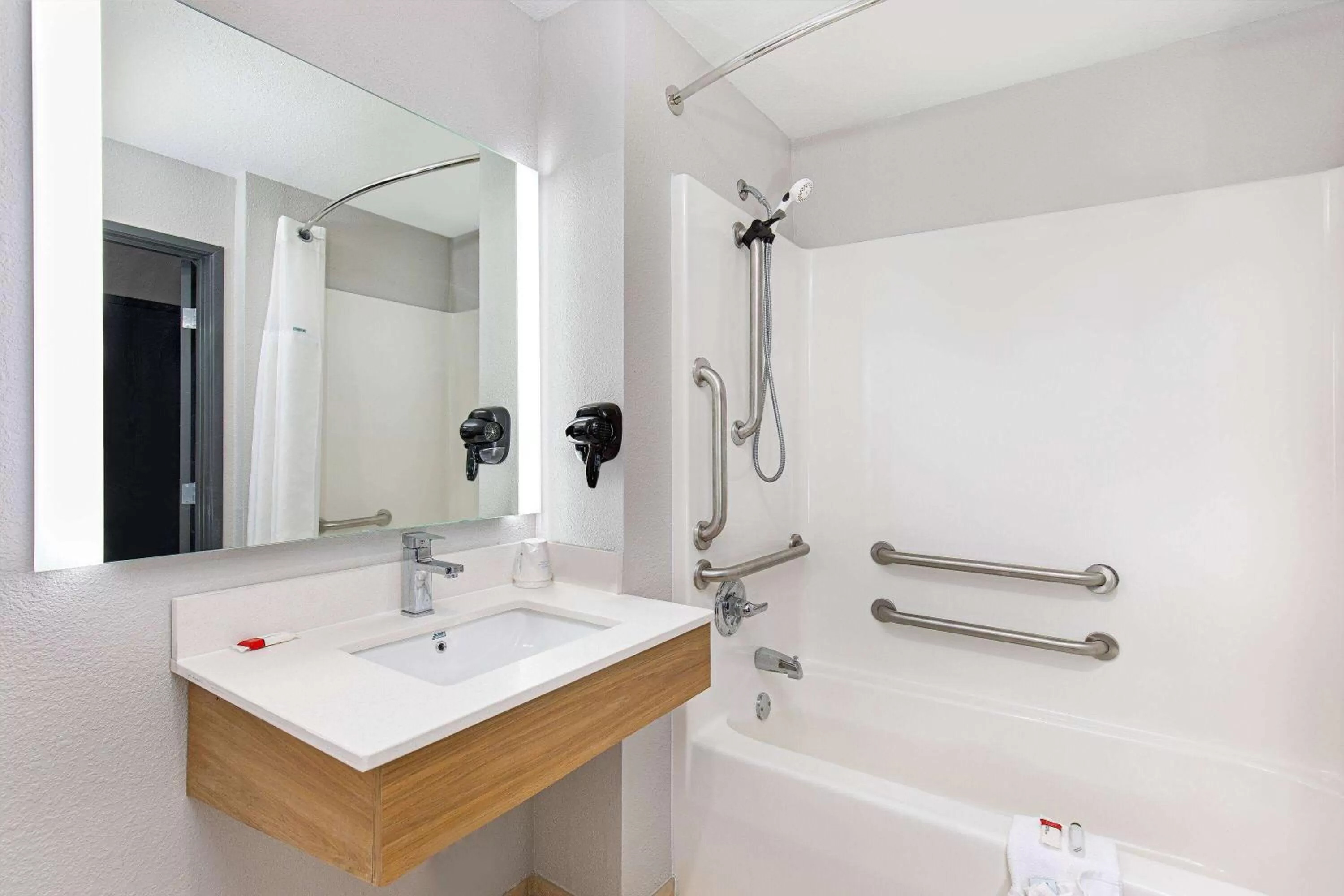 Bathroom in Microtel Inn & Suites by Wyndham Manchester - Newly Renovated