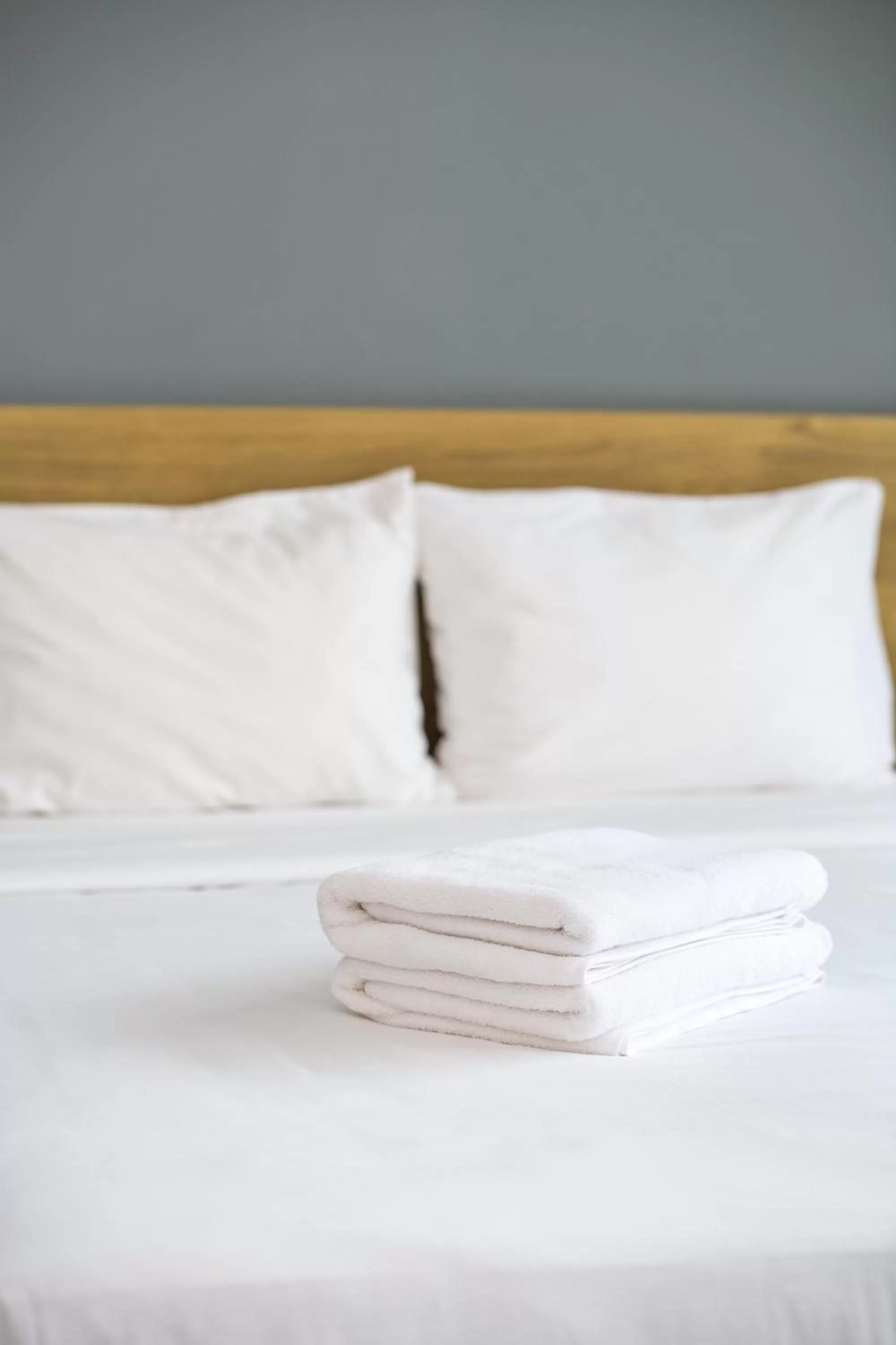 towels, Bed in The Green House - Serviced Apartment