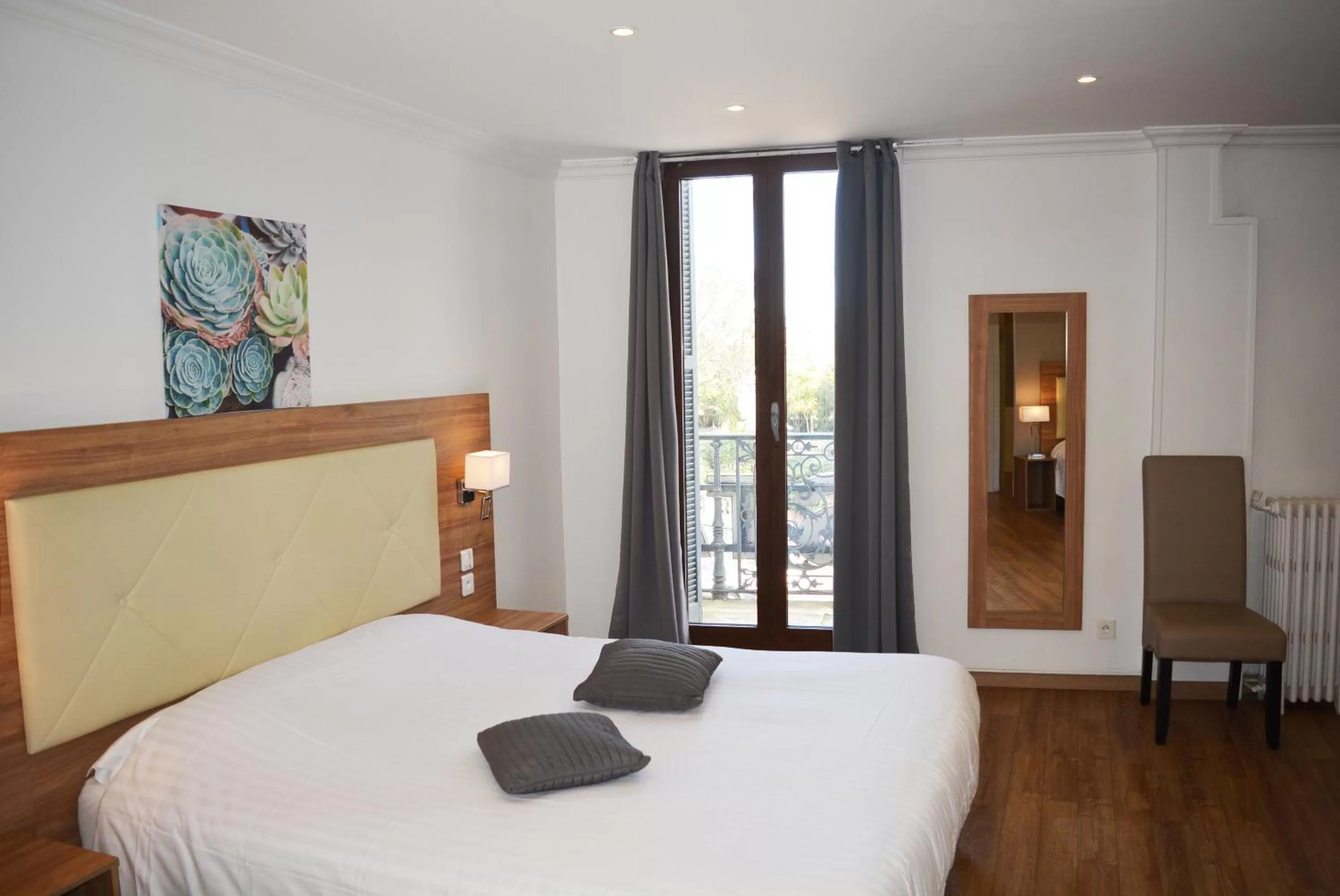 Bed in Le Grand Hôtel Molière