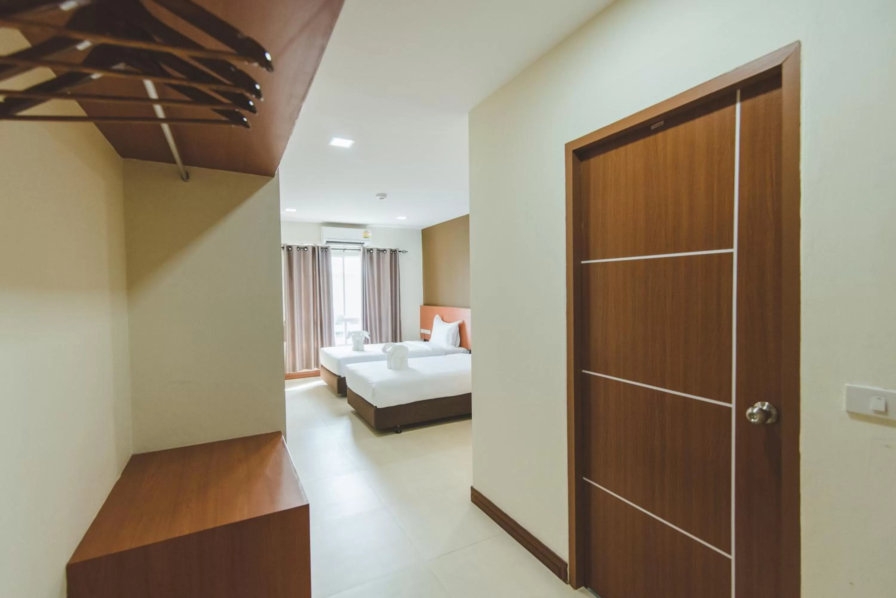 Bed in deVloft hotel Korat