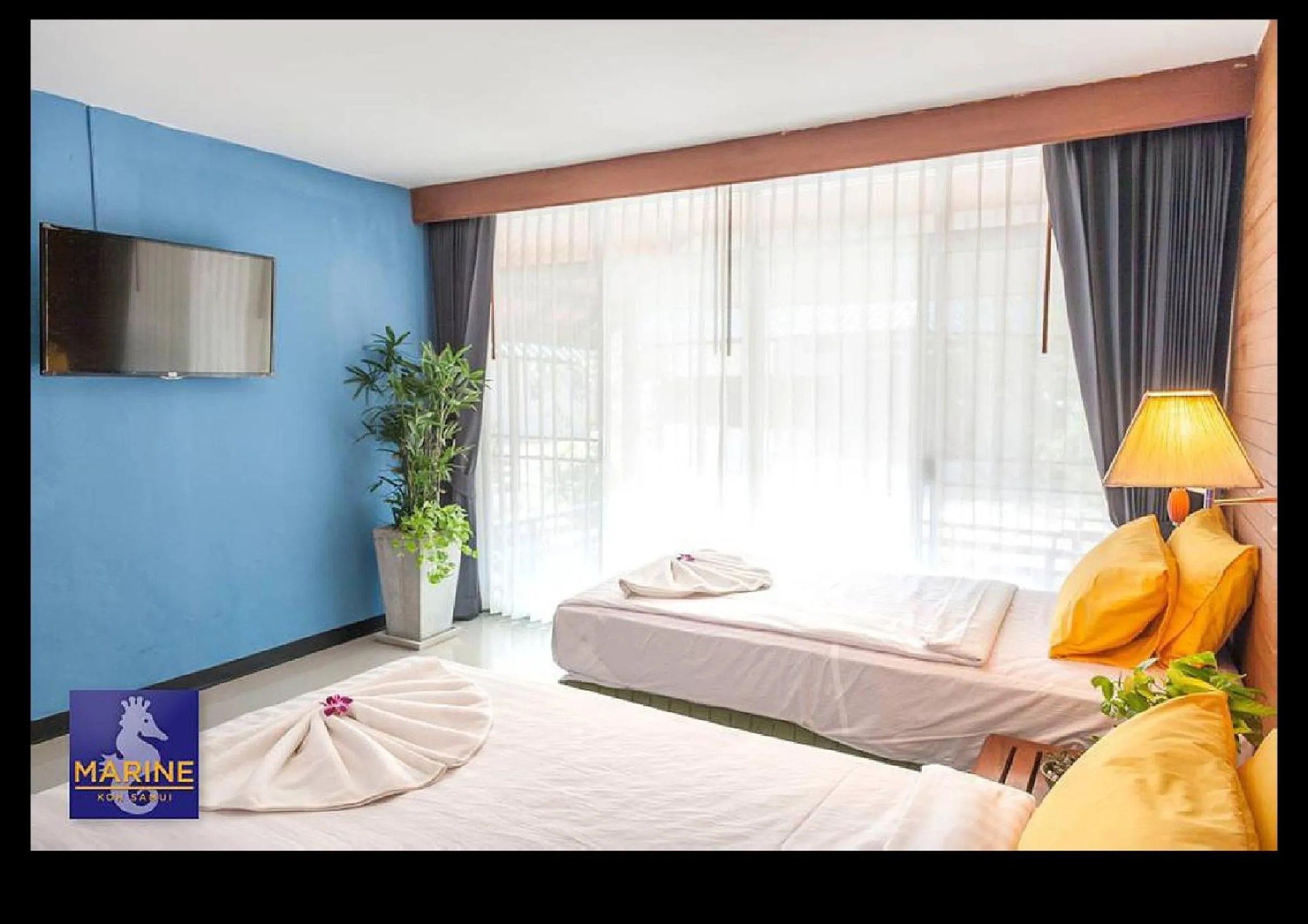 Bed in Marine Chaweng Beach Resort