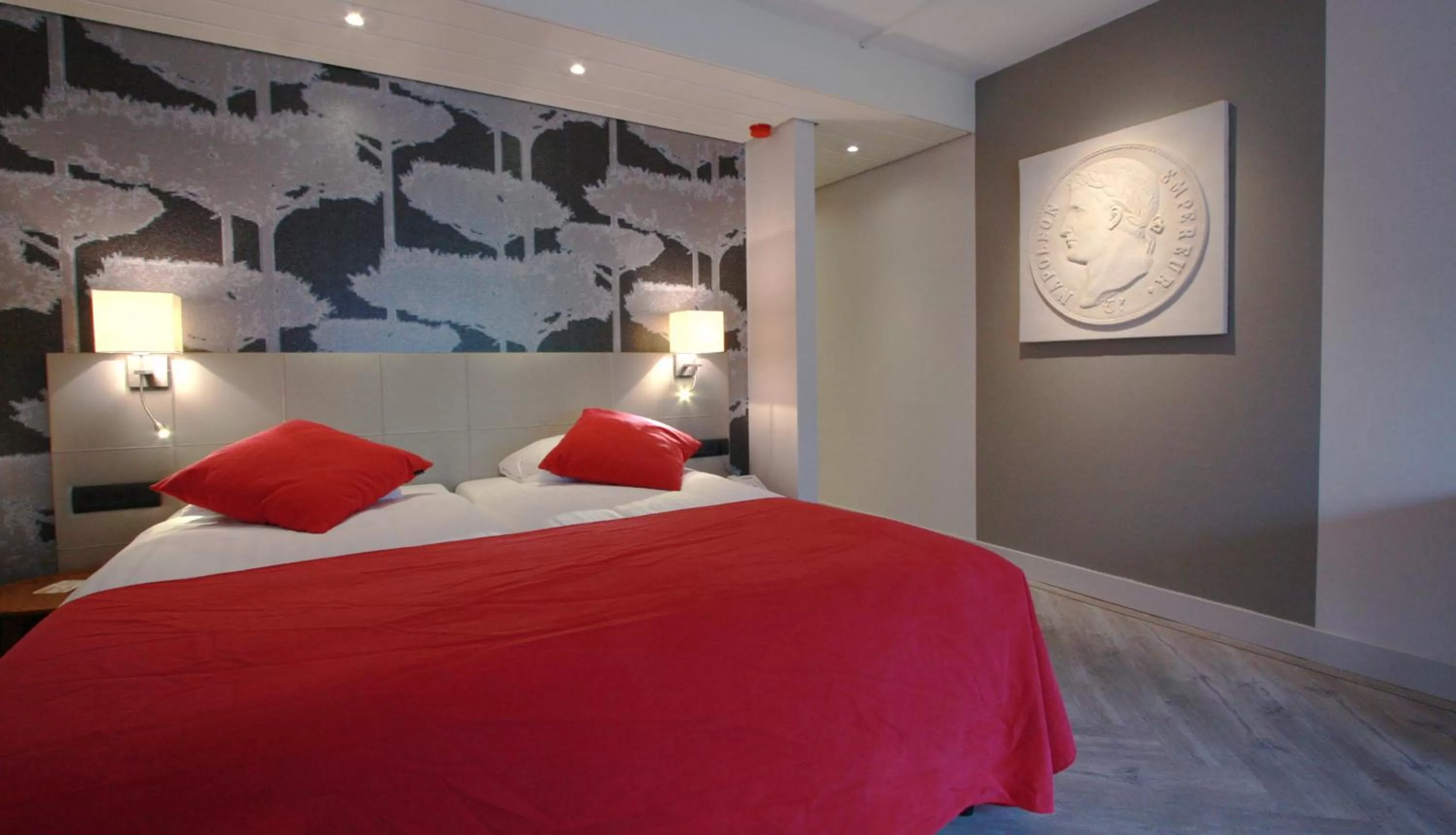 Bed in Fletcher Hotel-Restaurant Oud London