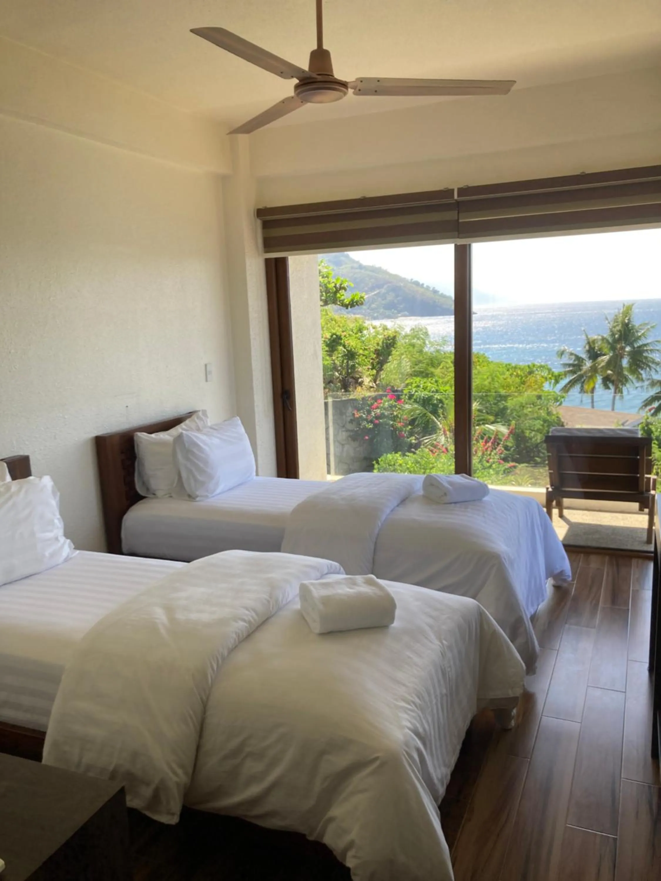 Bedroom, Bed in Sunset At Aninuan Beach Resort