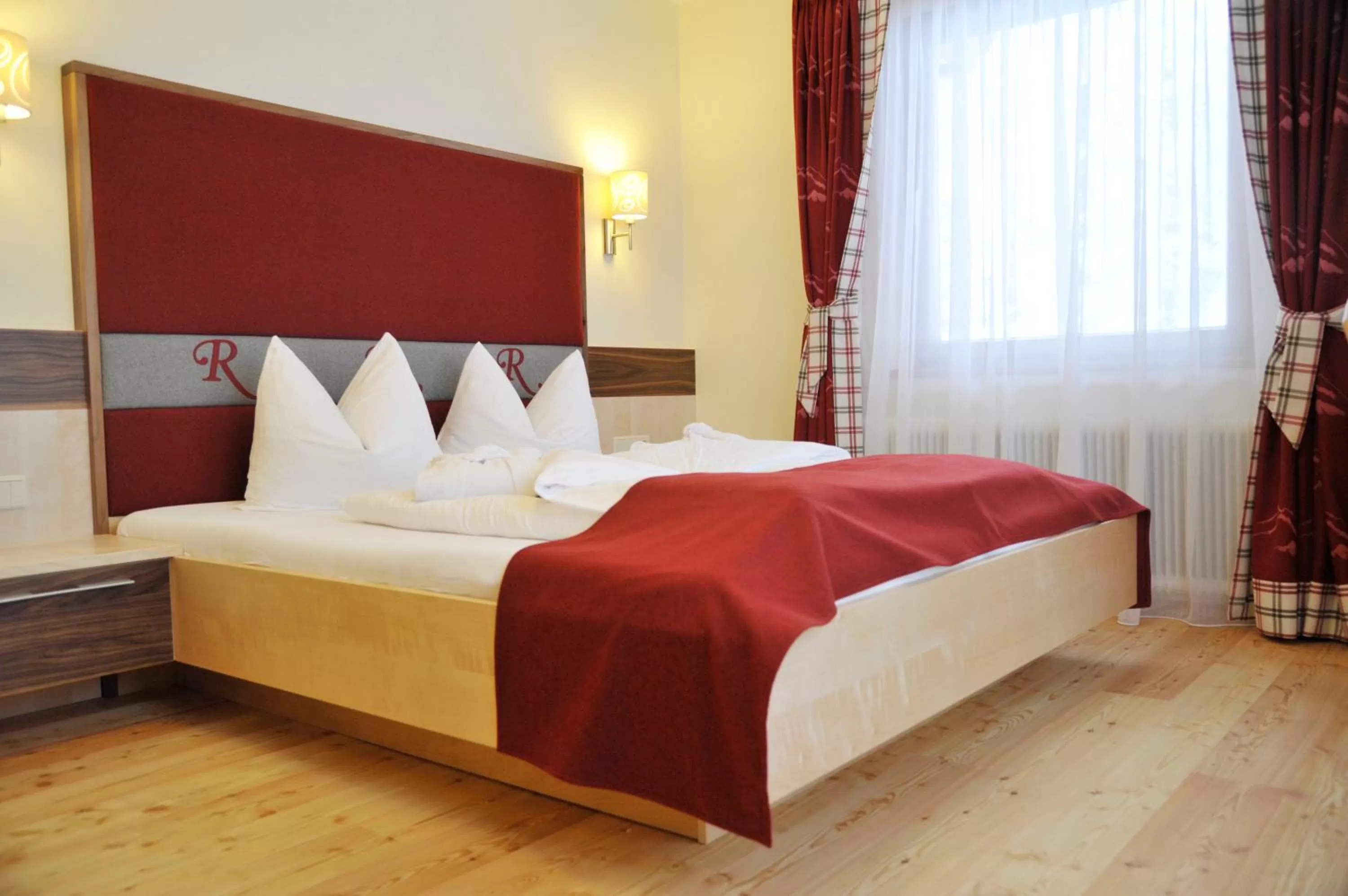 Bed in Hotel Rösslhof