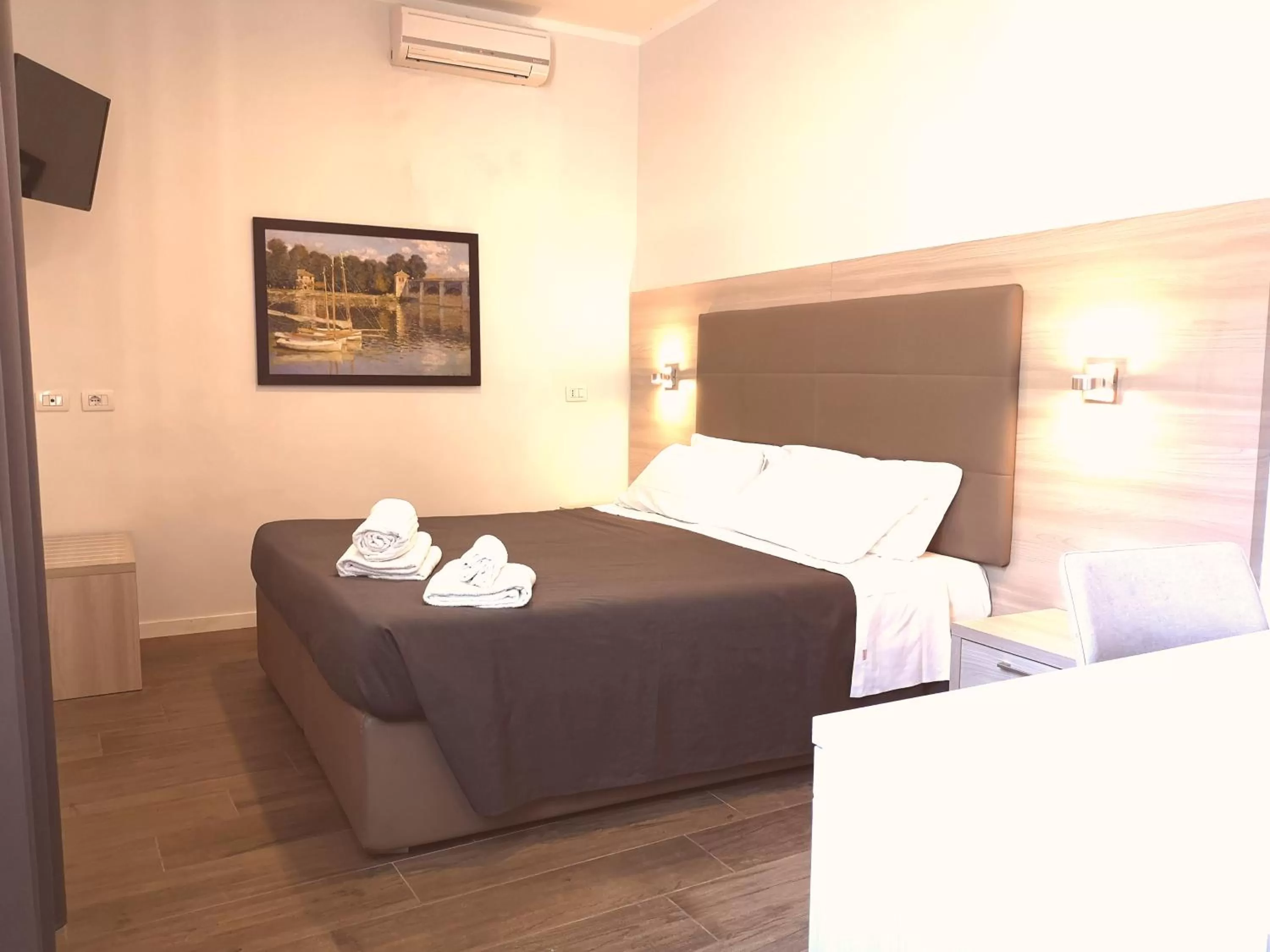 Bed in Academy Hotel