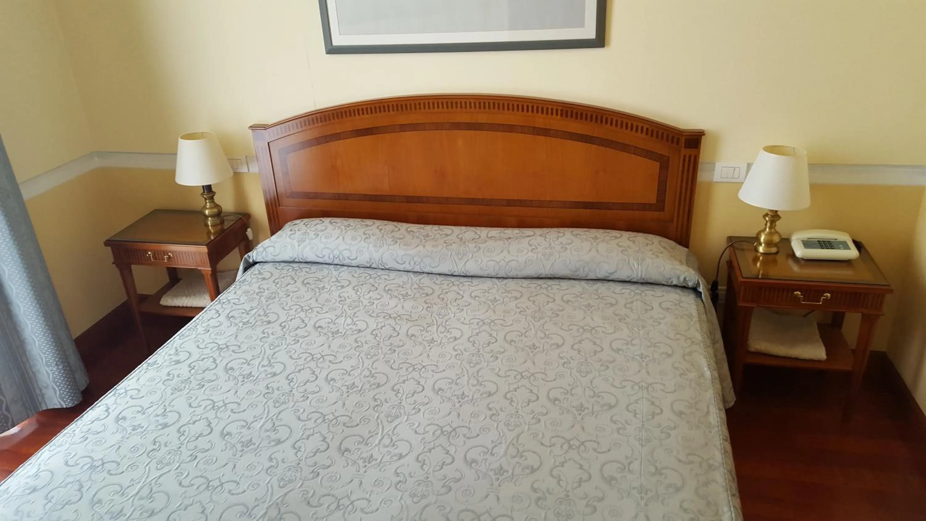 Bed in Hotel Continental