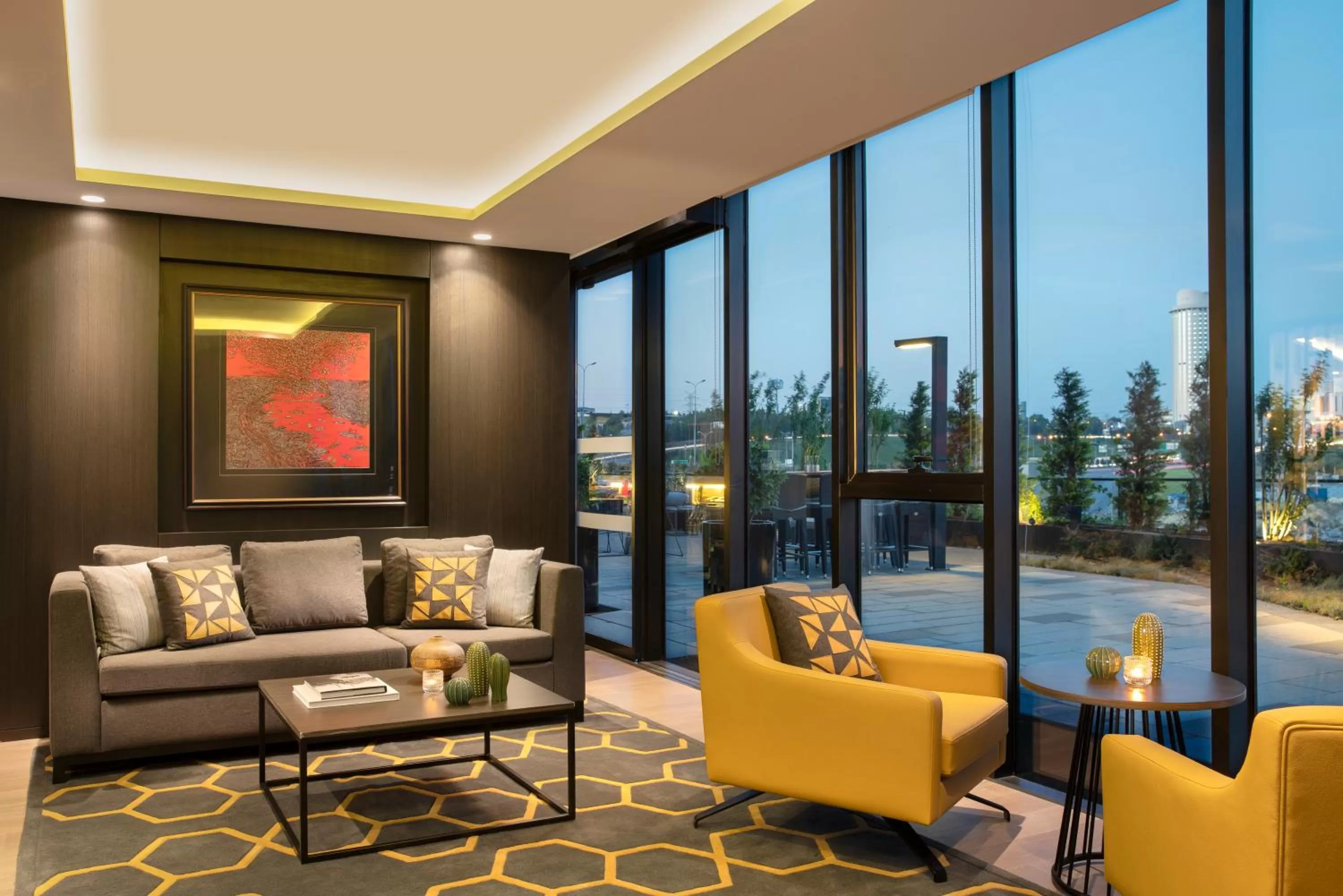 Lounge or bar in WestSide Residences by Rotana