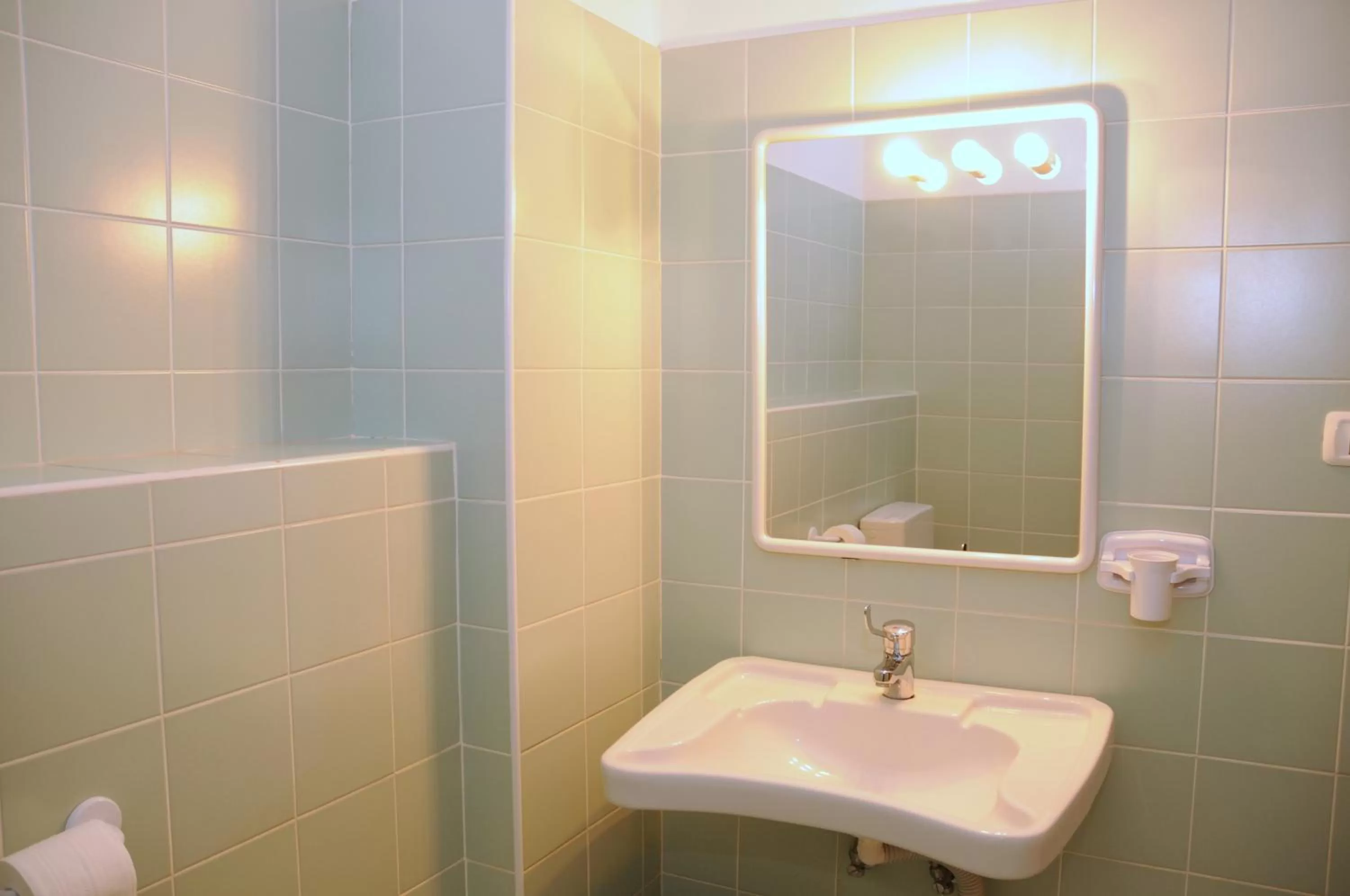 Bathroom in Hotel Oasi