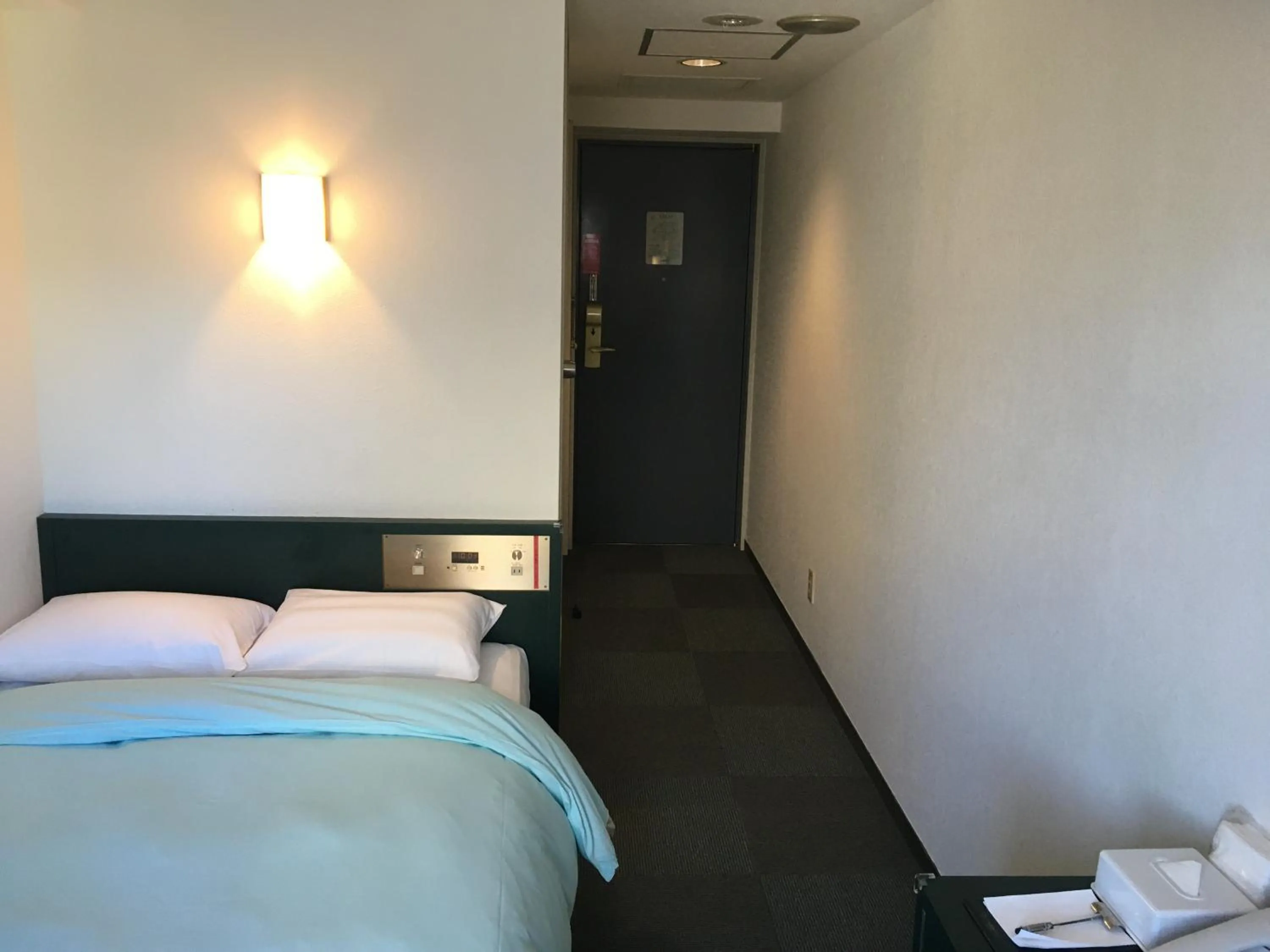 Bed in Olympic Inn Azabu