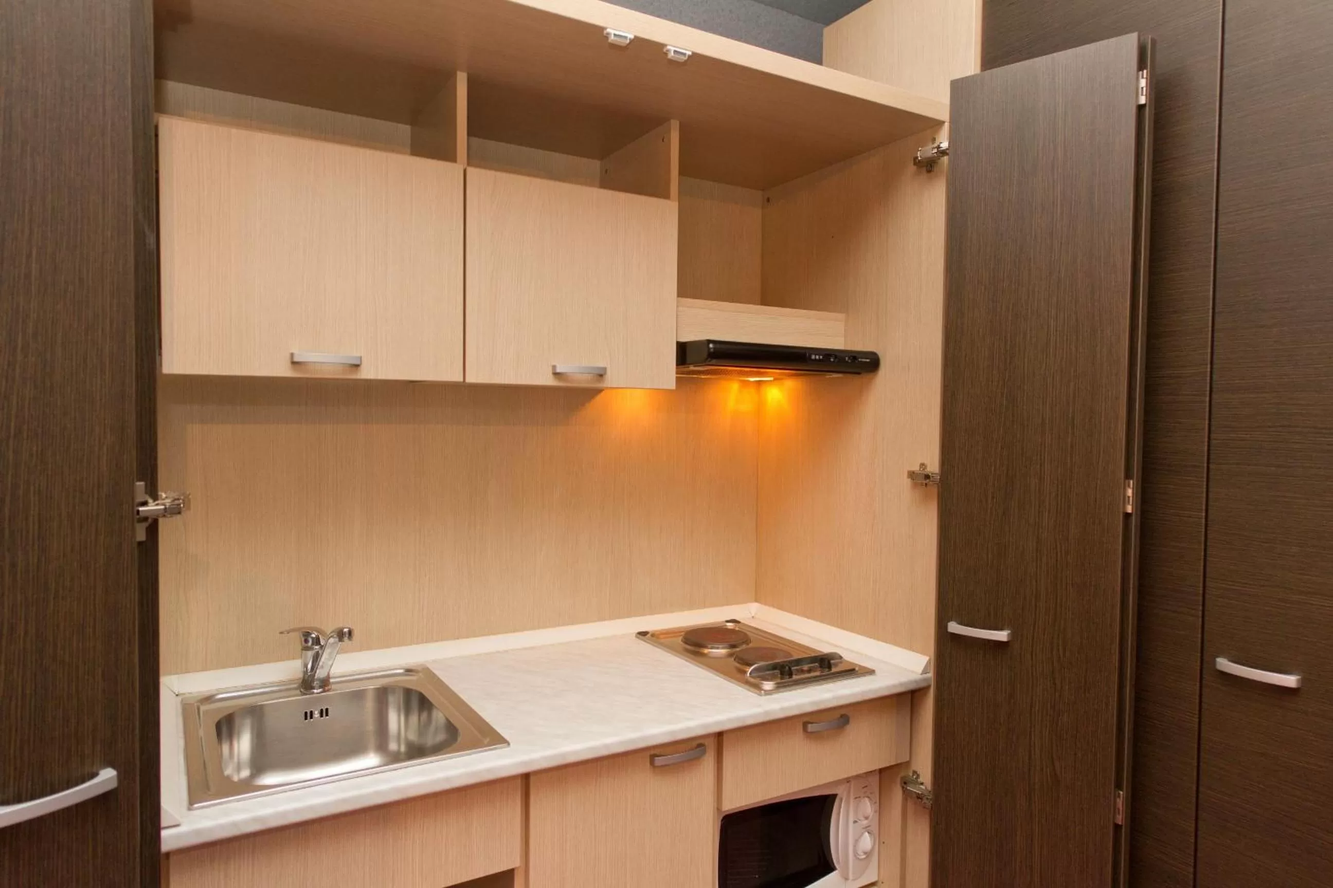 Kitchen or kitchenette in Residence & Suites