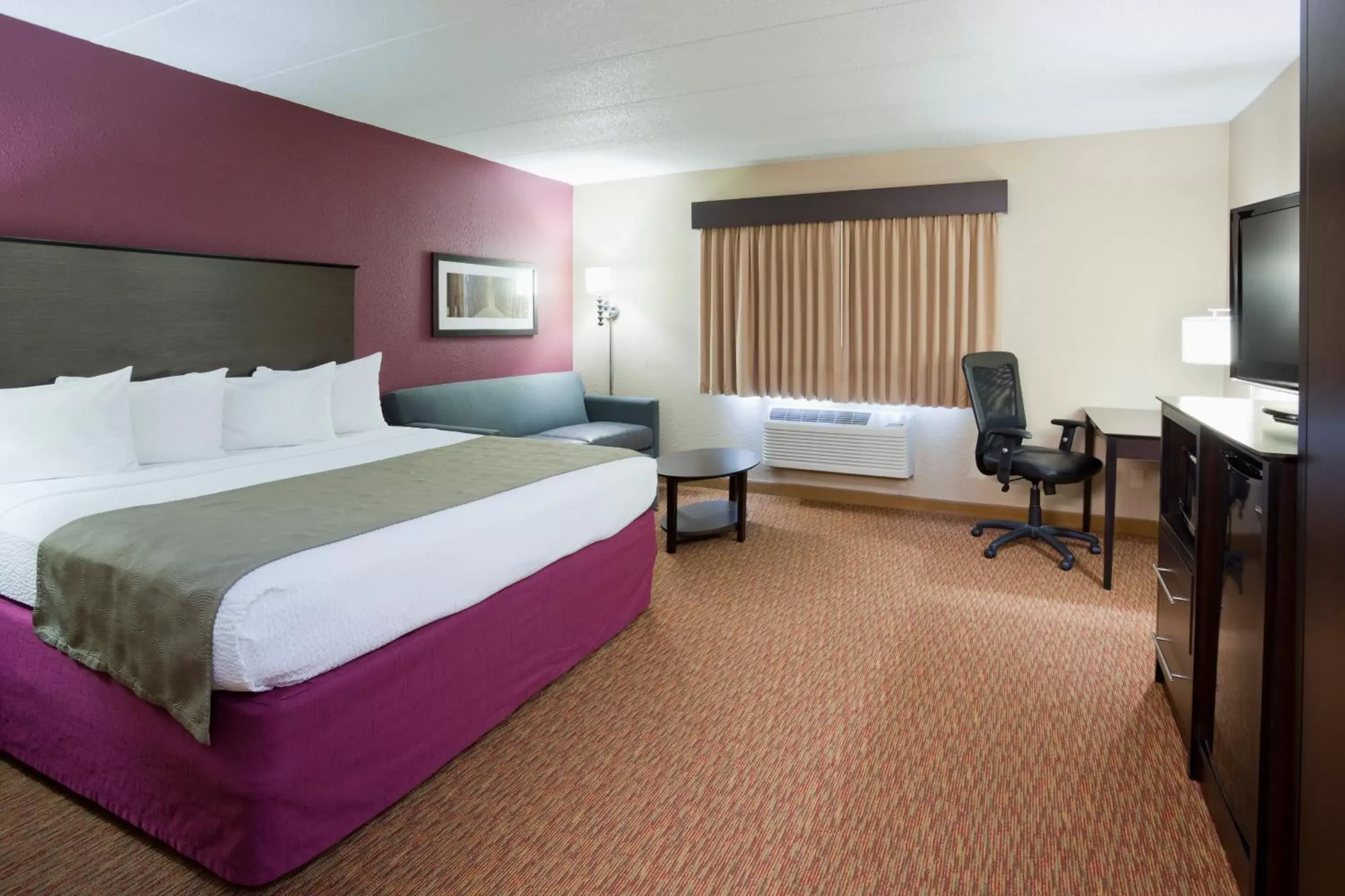 Deluxe King Room - Non-Smoking in AmericInn by Wyndham Osceola Deluxe King Room - Non-Smoking in AmericInn by Wyndham Osceola