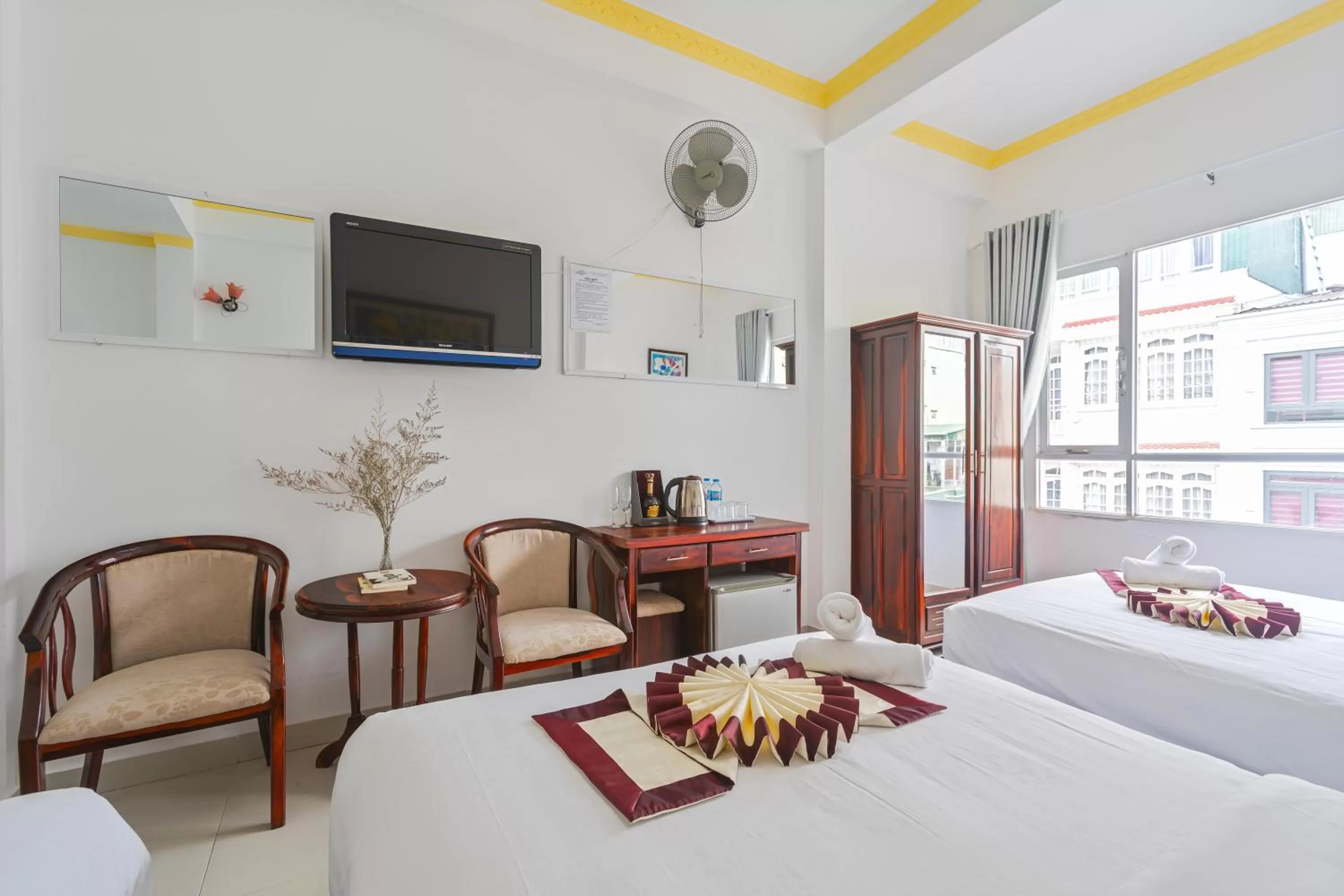 Bed, TV/Entertainment Center in Miền Nhiệt Đới 2 Hotel