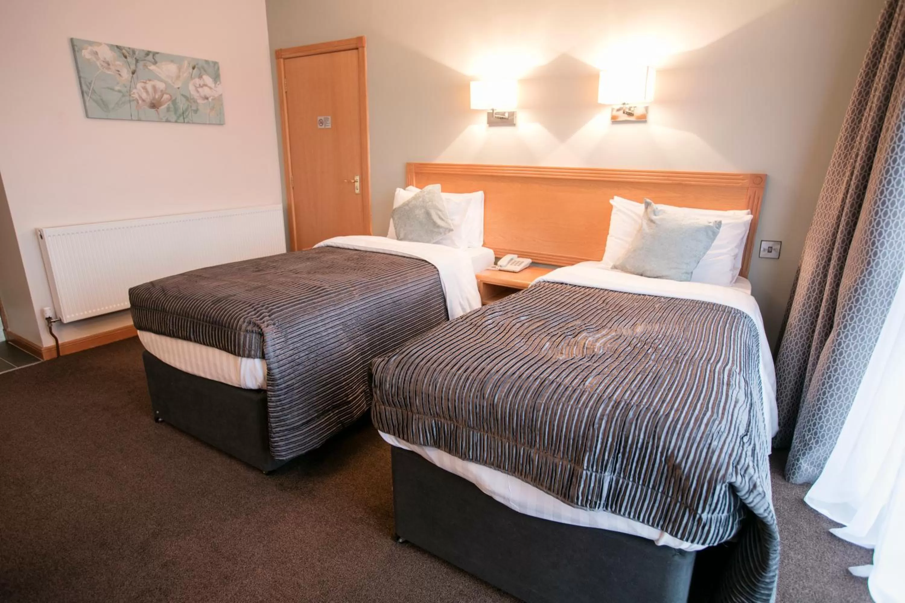 Bed in La Mon Hotel & Country Club